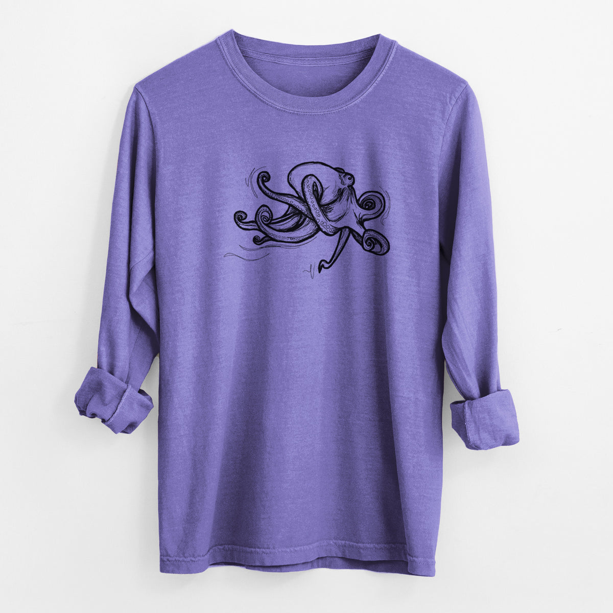 Violet purple Comfort Colors long sleeve shirt laid flat with the cuffs rolled, printed with a black ink illustration of a giant Pacific octopus with curling tentacles.