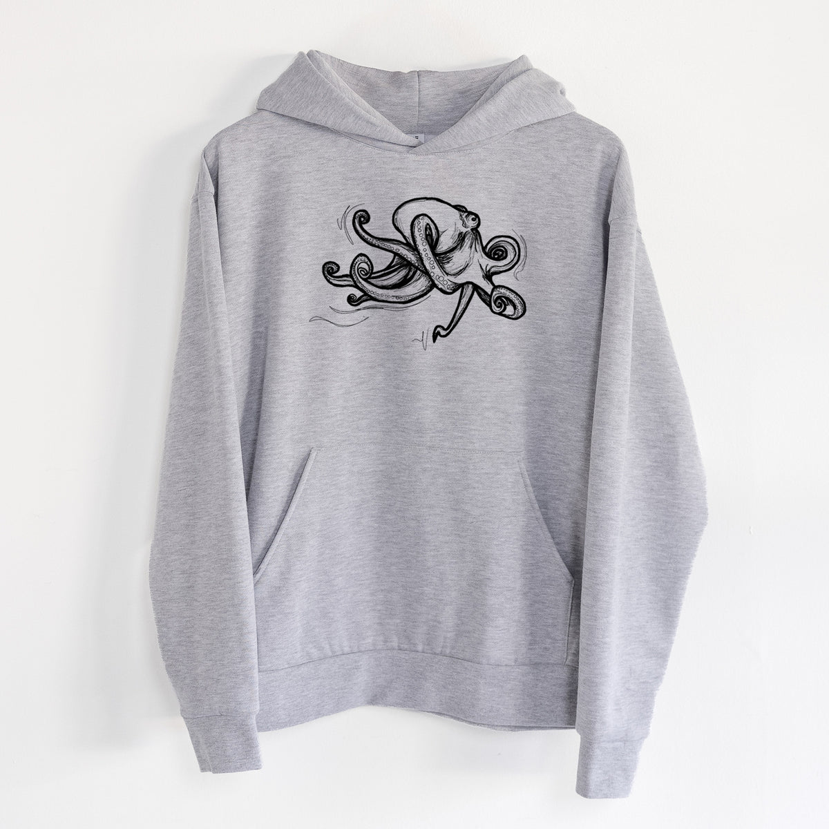 Giant Pacific Octopus - Statement Midweight Hoodie in Heather Grey, hanging on a white wall, with a front kangaroo pocket and no drawcords.