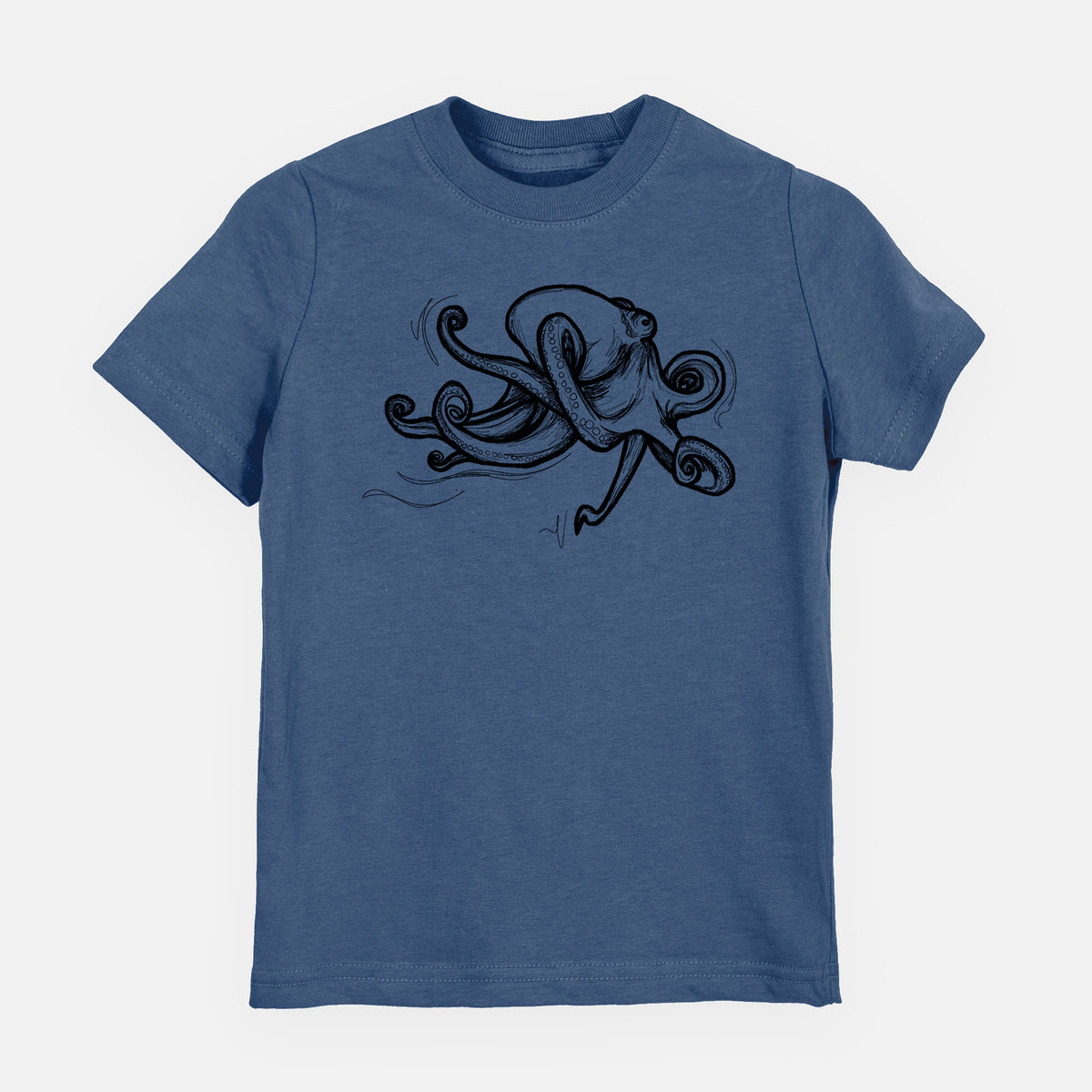 Indigo blue youth t-shirt laid flat, printed with a black ink illustration of a giant Pacific octopus with curling tentacles.