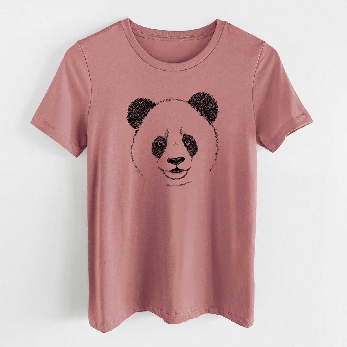 Mauve pink women's relaxed fit cotton t-shirt laid flat, printed with a black ink portrait of a smiling giant panda's face.