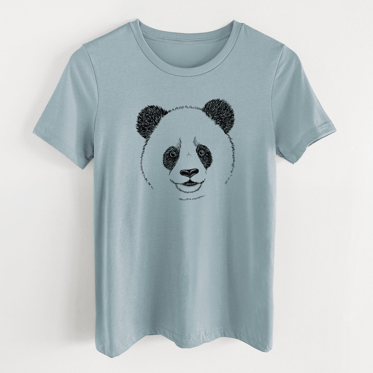Vintage denim women's relaxed fit cotton t-shirt laid flat, printed with a black ink portrait of a smiling giant panda's face.