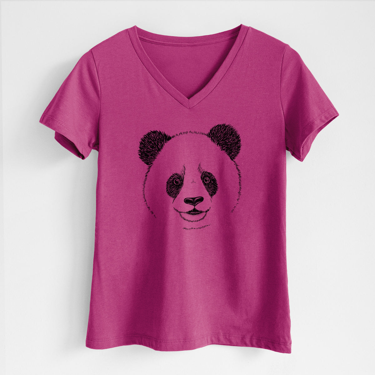 Berry pink women's relaxed fit cotton V-neck t-shirt laid flat, printed with a black ink portrait of a smiling giant panda's face.