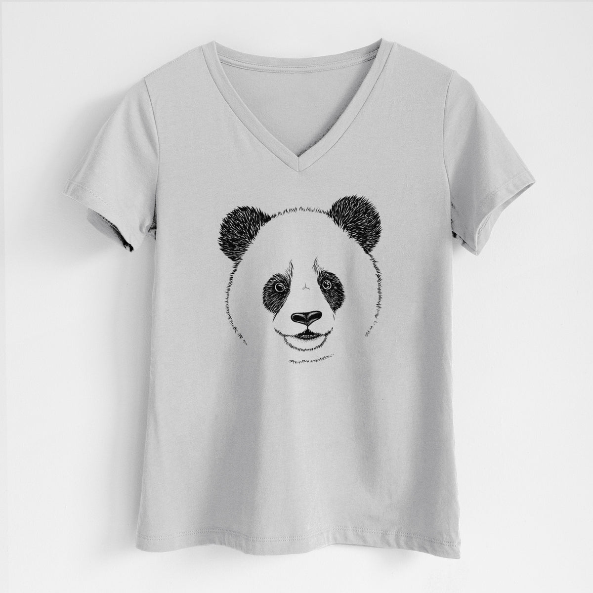 Lunar grey women's relaxed fit cotton V-neck t-shirt laid flat, printed with a black ink portrait of a smiling giant panda's face.