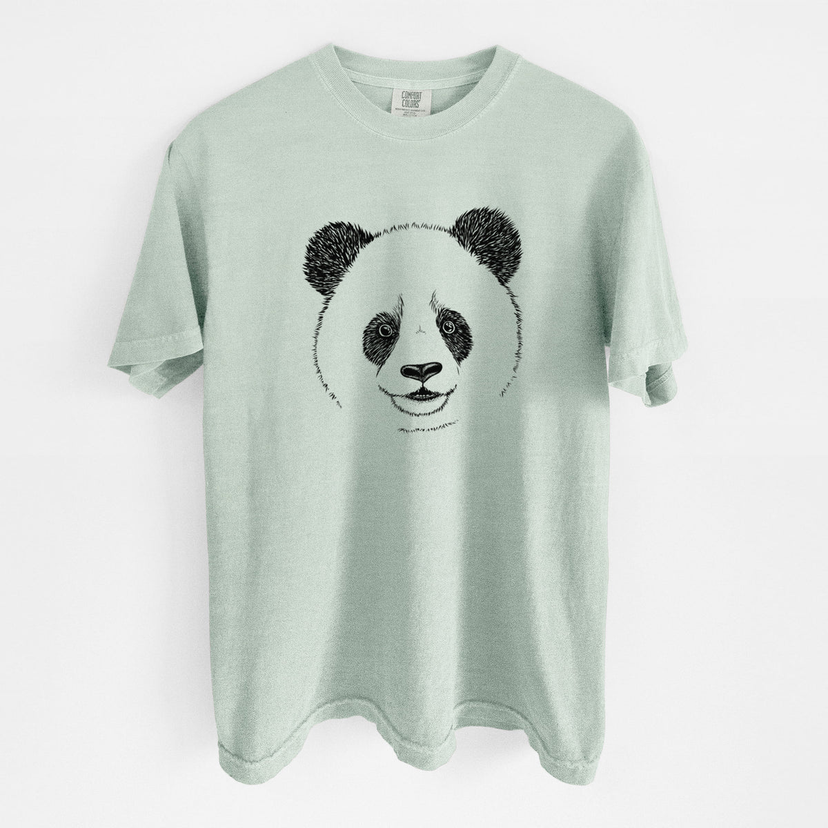 Bay green Comfort Colors t-shirt laid flat, printed with a black ink portrait of a smiling giant panda's face.