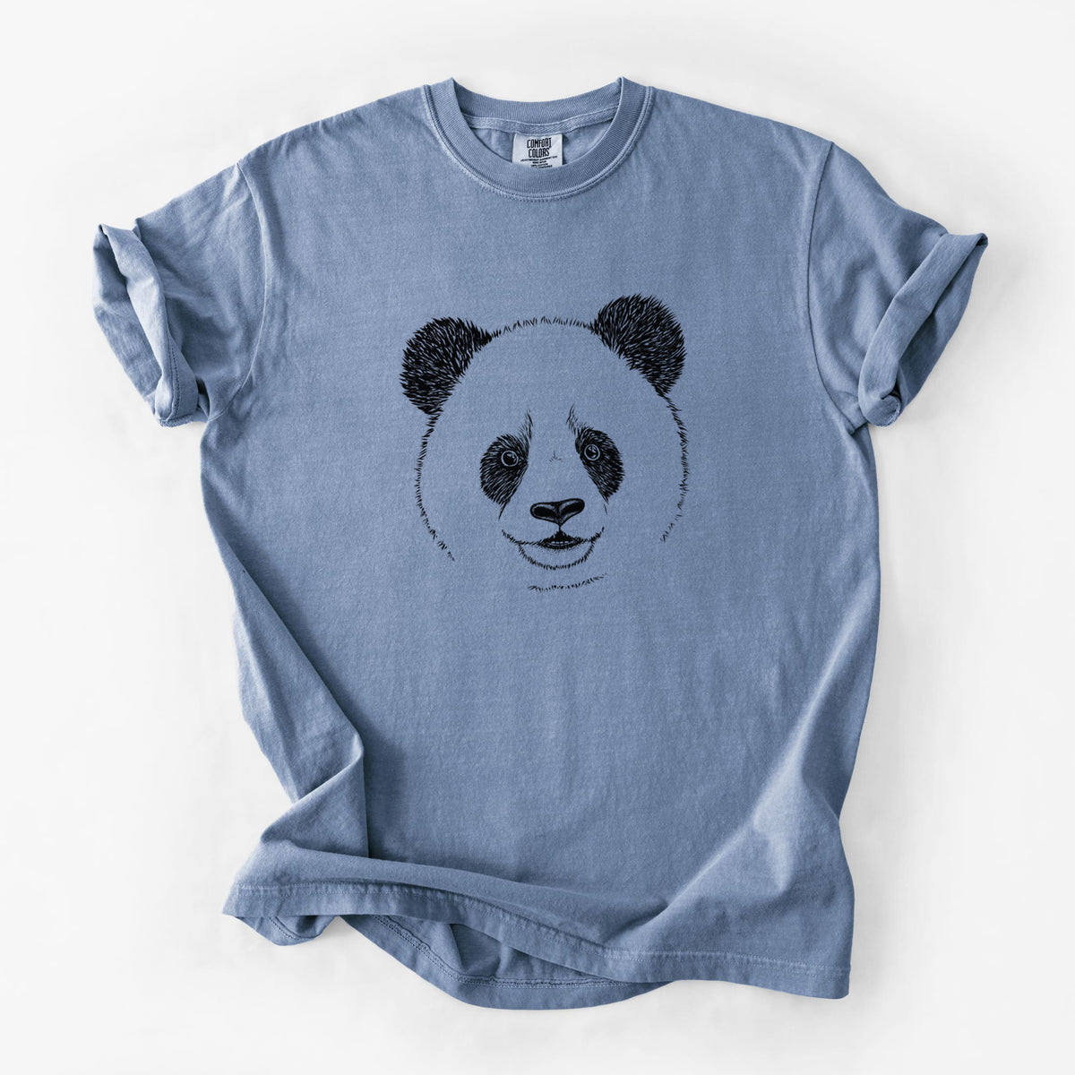 Blue jean Comfort Colors t-shirt laid flat, printed with a black ink portrait of a smiling giant panda's face.