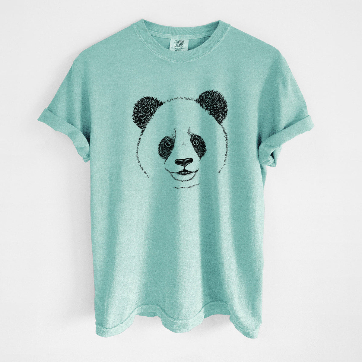 Chalky mint Comfort Colors t-shirt laid flat, printed with a black ink portrait of a smiling giant panda's face.