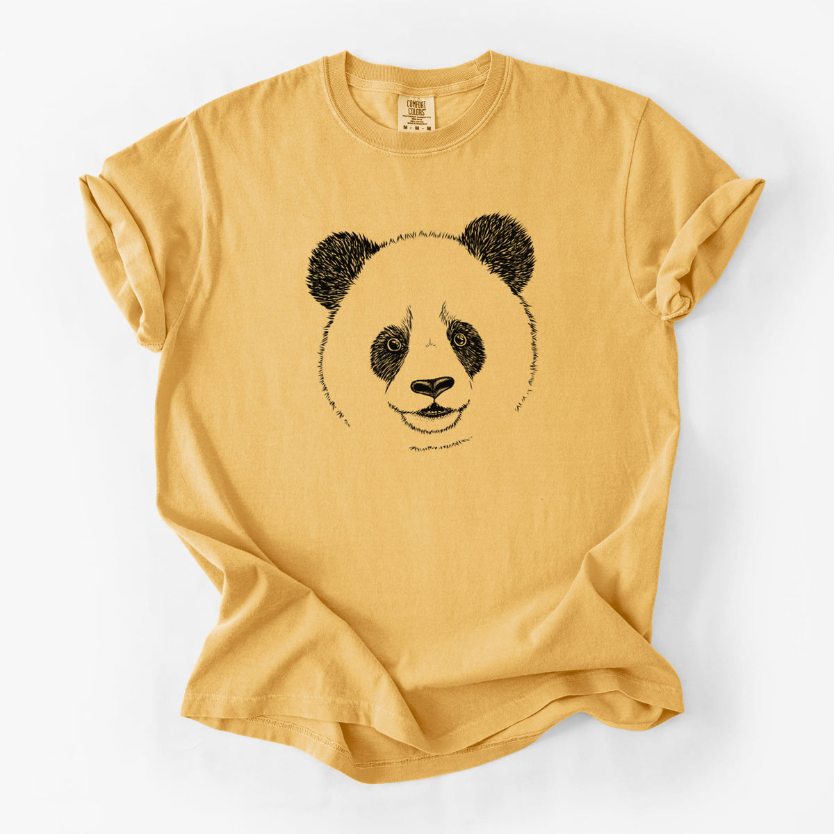 Golden wheat yellow Comfort Colors t-shirt laid flat, printed with a black ink portrait of a smiling giant panda's face.