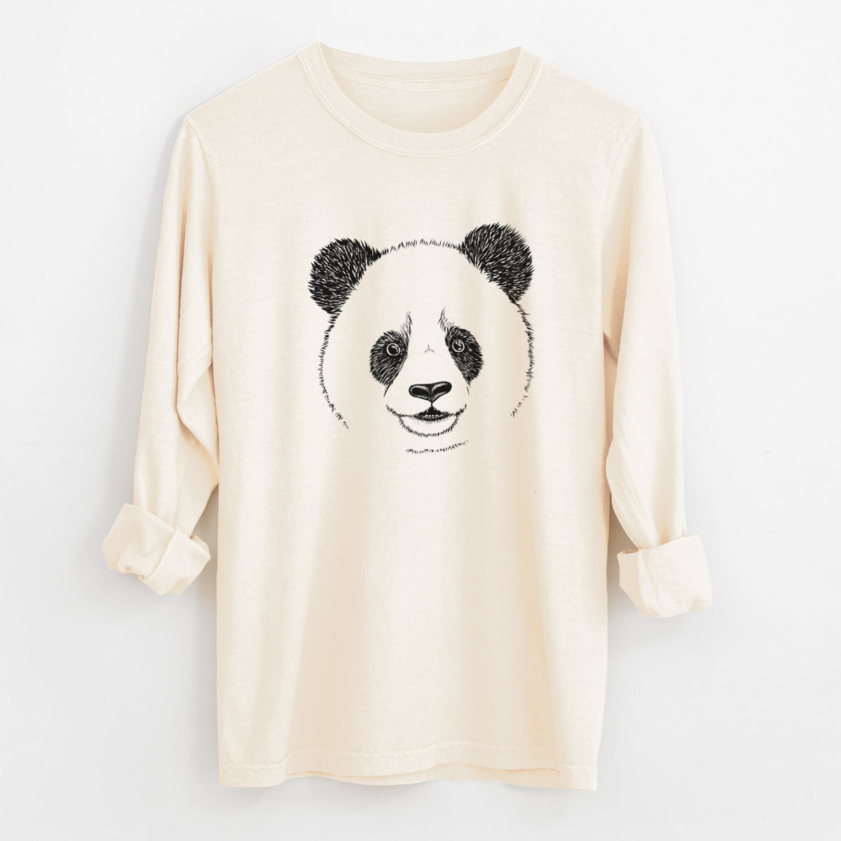 Ivory Comfort Colors long sleeve shirt laid flat with the cuffs rolled, printed with a black ink portrait of a smiling giant panda's face.