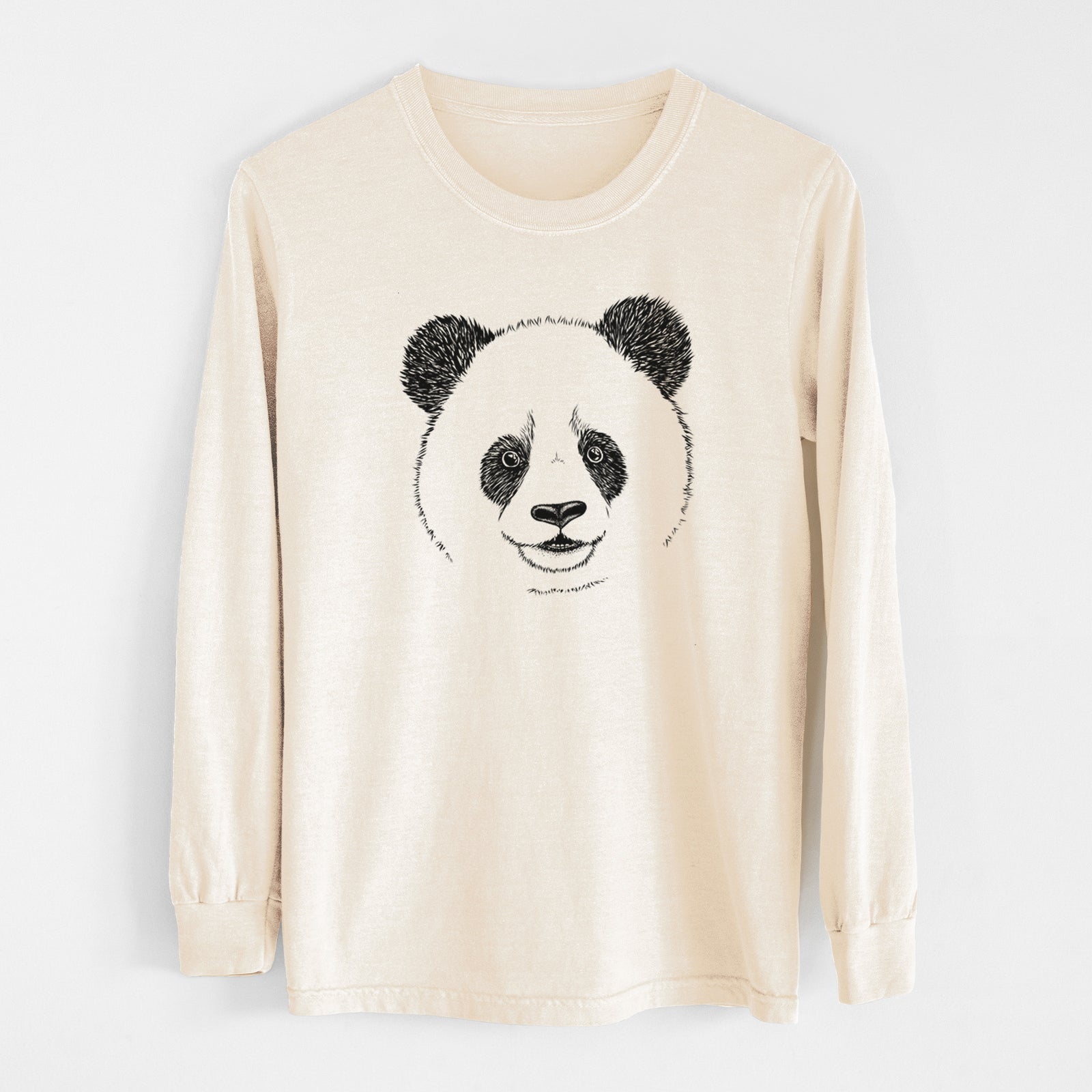 Ivory Comfort Colors long sleeve shirt laid flat, printed with a black ink portrait of a smiling giant panda's face.