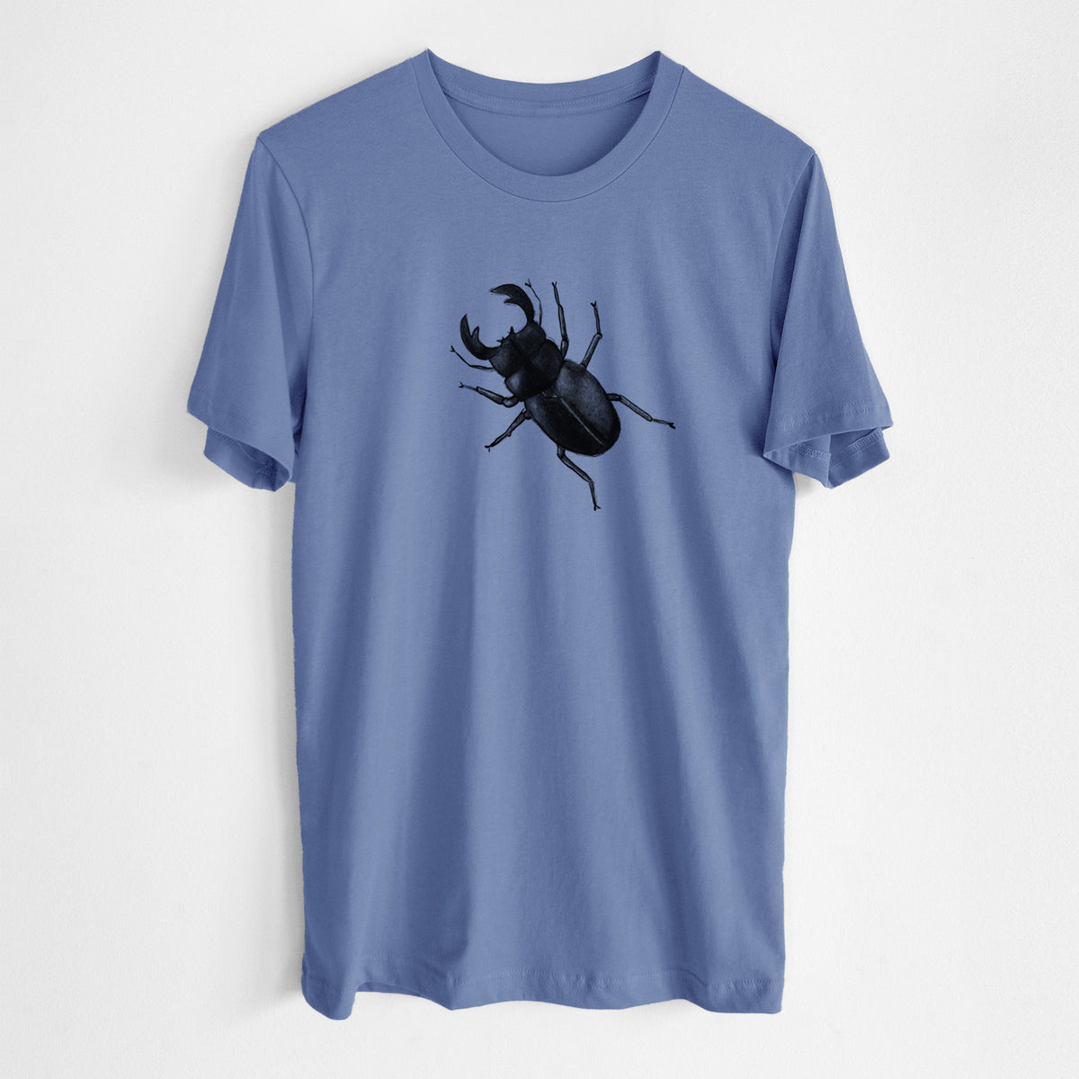 Blue bell lightweight cotton t-shirt laid flat, printed with a detailed black ink illustration of a giant stag beetle with large jaws, seen from above.