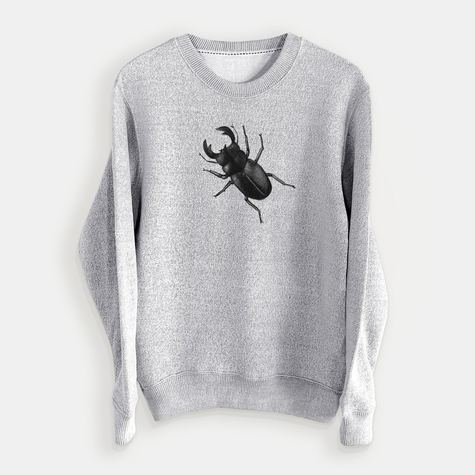 Salt and pepper knit sweatshirt laid flat, printed with a detailed black ink illustration of a giant stag beetle with large jaws, seen from above.