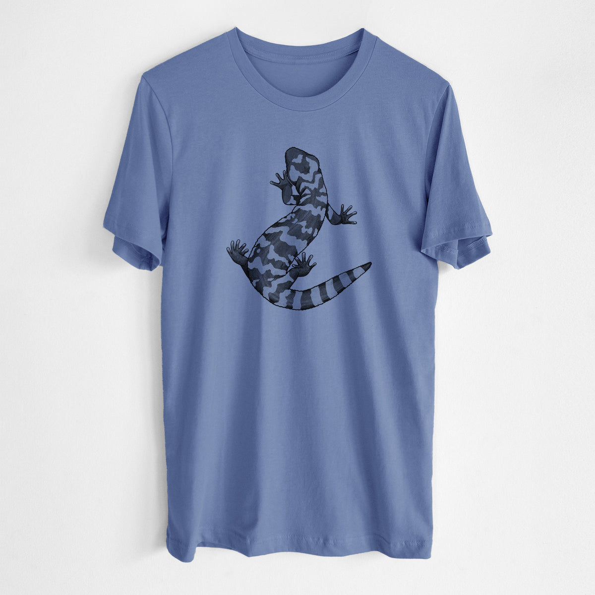 Blue bell lightweight cotton t-shirt laid flat, printed with a black ink illustration of a Gila monster with bold patterned skin.