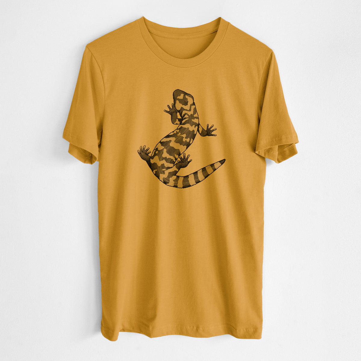 Honeycomb yellow lightweight cotton t-shirt laid flat, printed with a black ink illustration of a Gila monster with bold patterned skin.