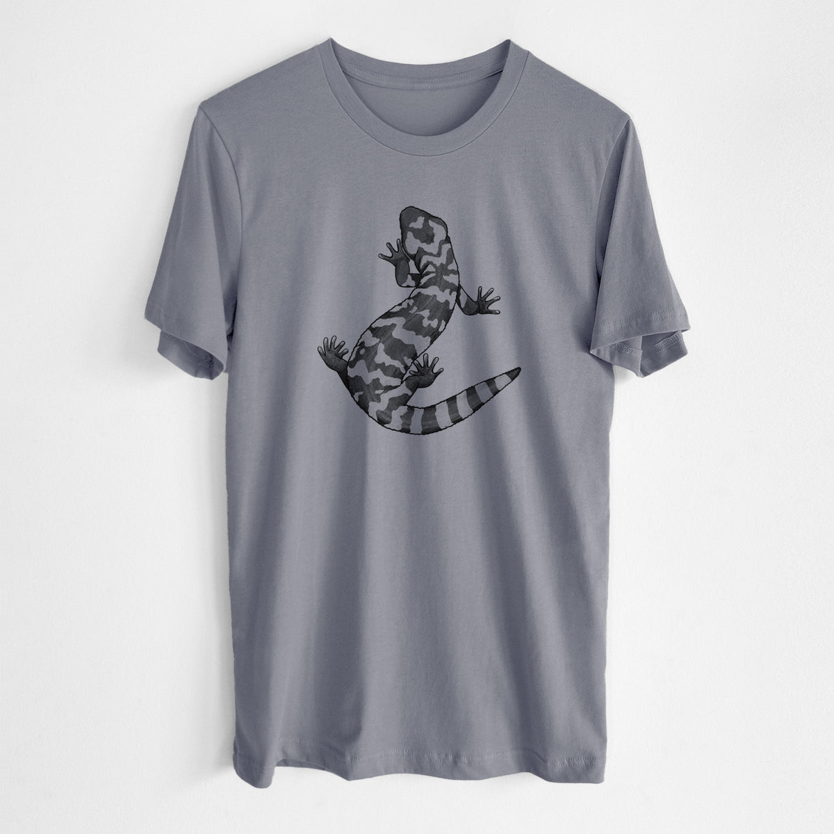 Storm grey lightweight cotton t-shirt laid flat, printed with a black ink illustration of a Gila monster with bold patterned skin.