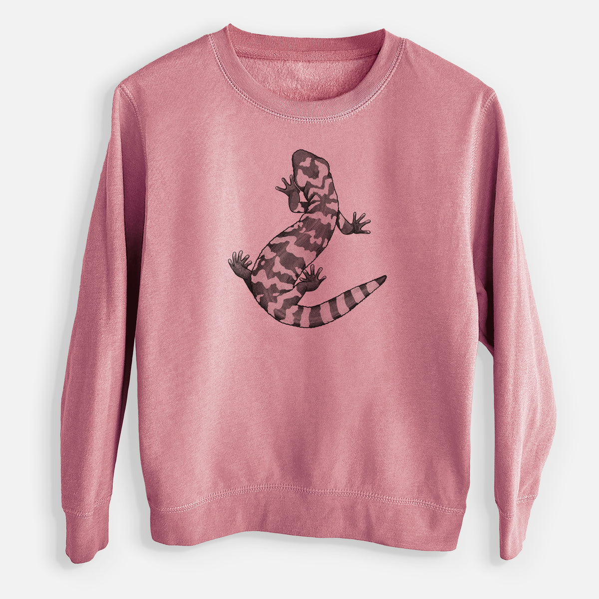 Mauve pink youth crewneck sweatshirt laid flat, printed with a black ink illustration of a Gila monster with bold patterned skin.