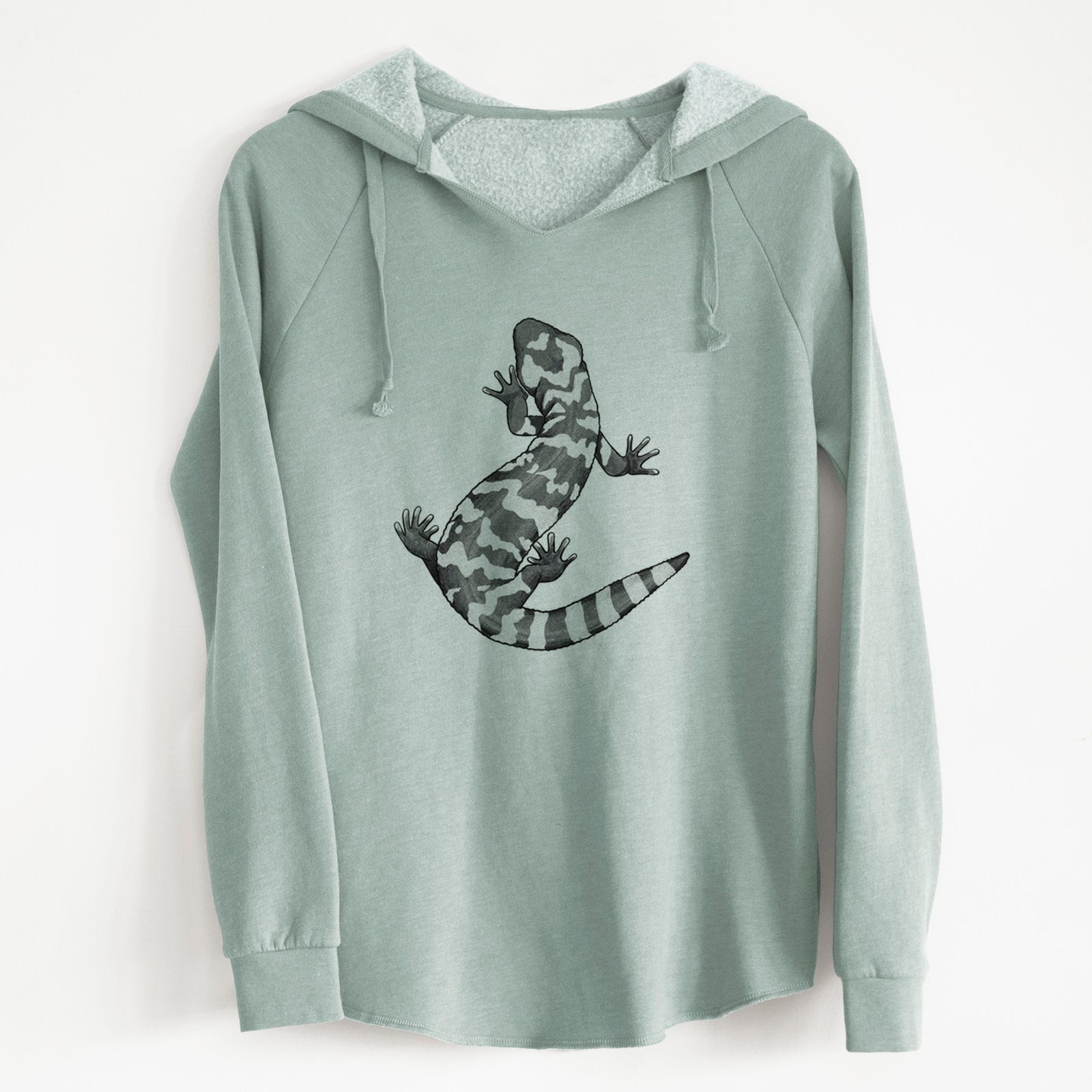 Sage green women's Cali Wave hooded sweatshirt laid flat, printed with a black ink illustration of a Gila monster with bold patterned skin.