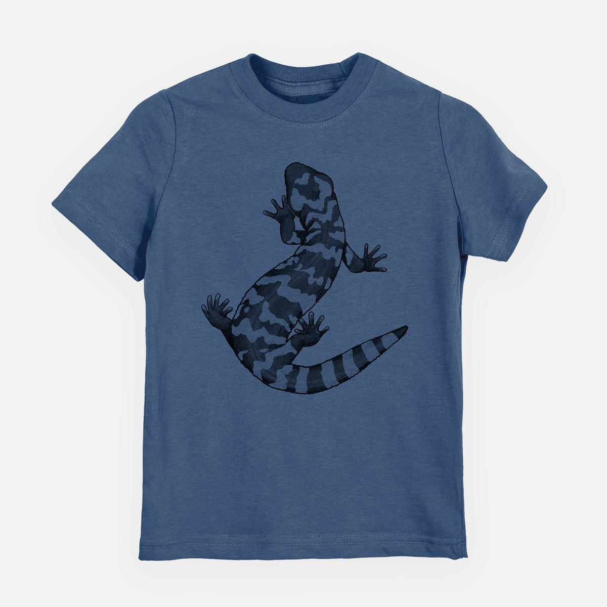 Indigo blue youth t-shirt laid flat, printed with a black ink illustration of a Gila monster with bold patterned skin.