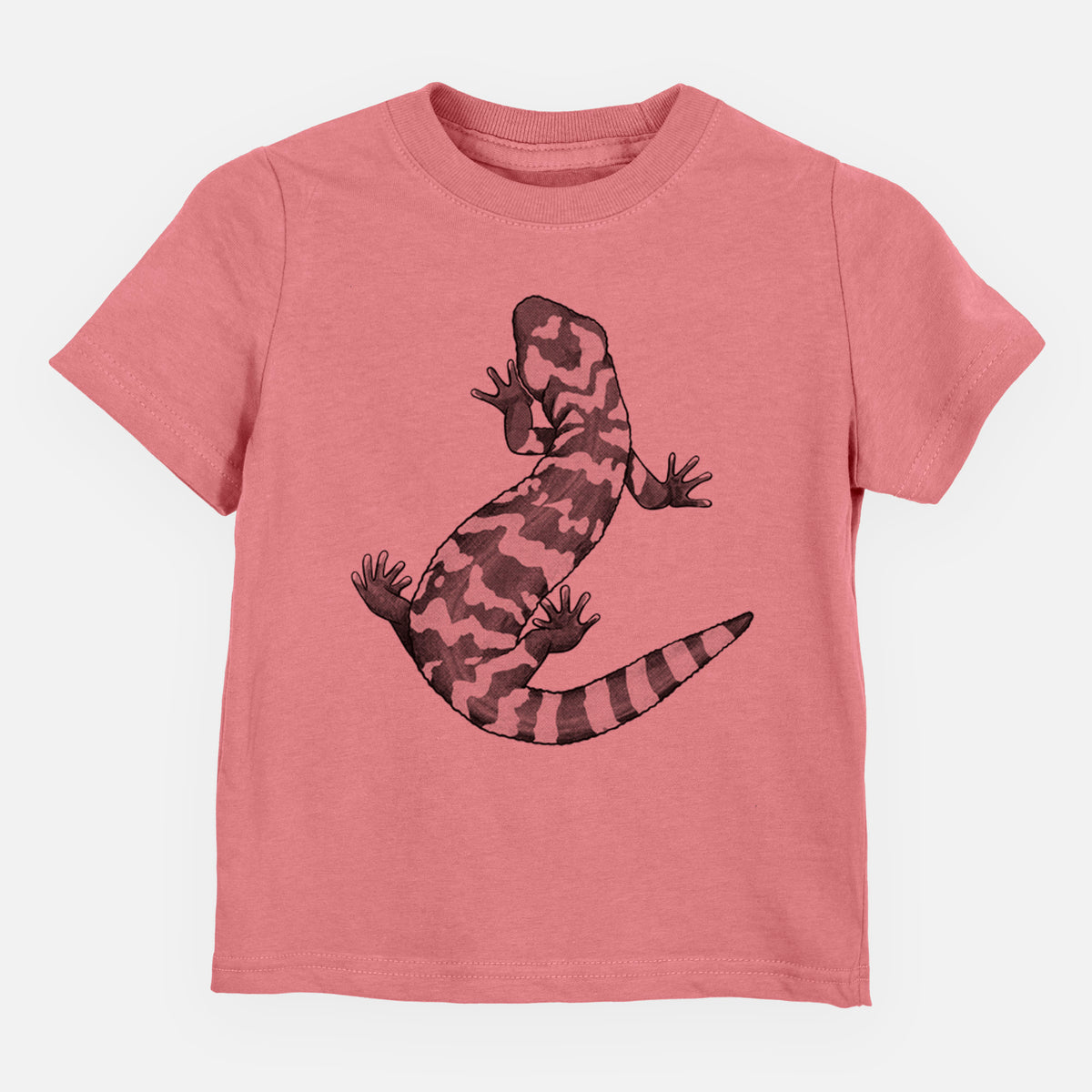 Mauve pink toddler t-shirt laid flat, printed with a black ink illustration of a Gila monster with bold patterned skin.