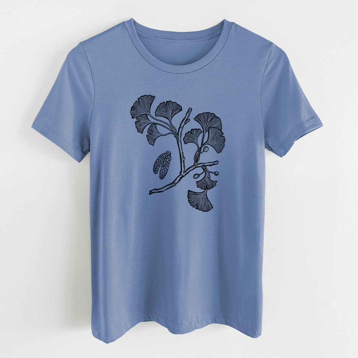 Blue bell women's relaxed fit cotton t-shirt laid flat, printed with a black ink illustration of a ginkgo branch with fan-shaped leaves.