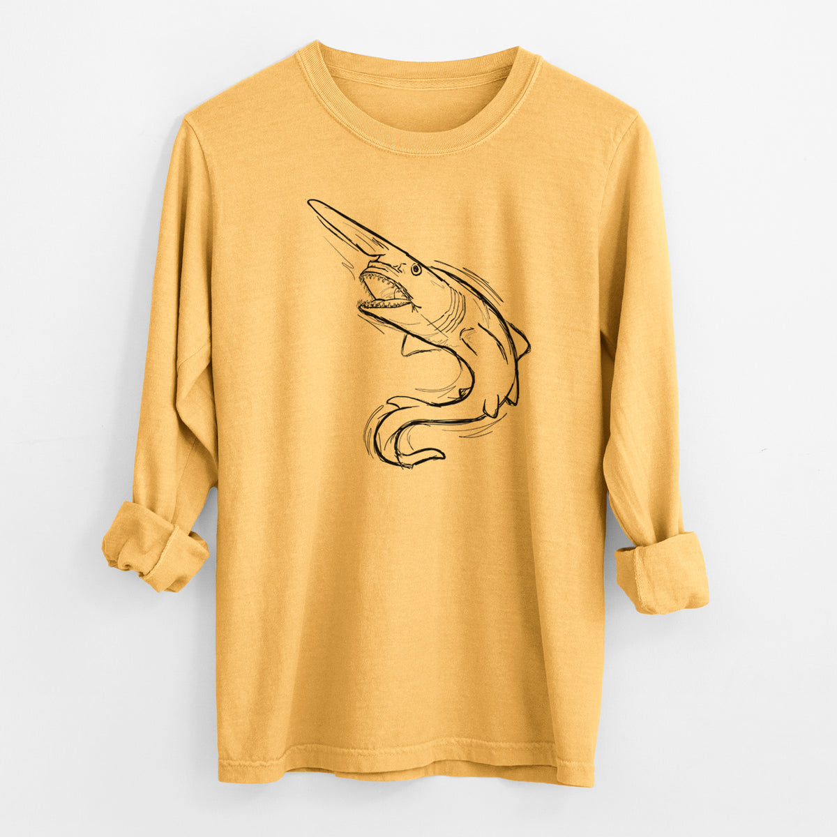 Golden wheat yellow Comfort Colors long sleeve shirt laid flat with the cuffs rolled, printed with a black ink illustration of a goblin shark with its long snout, swimming in a curve.