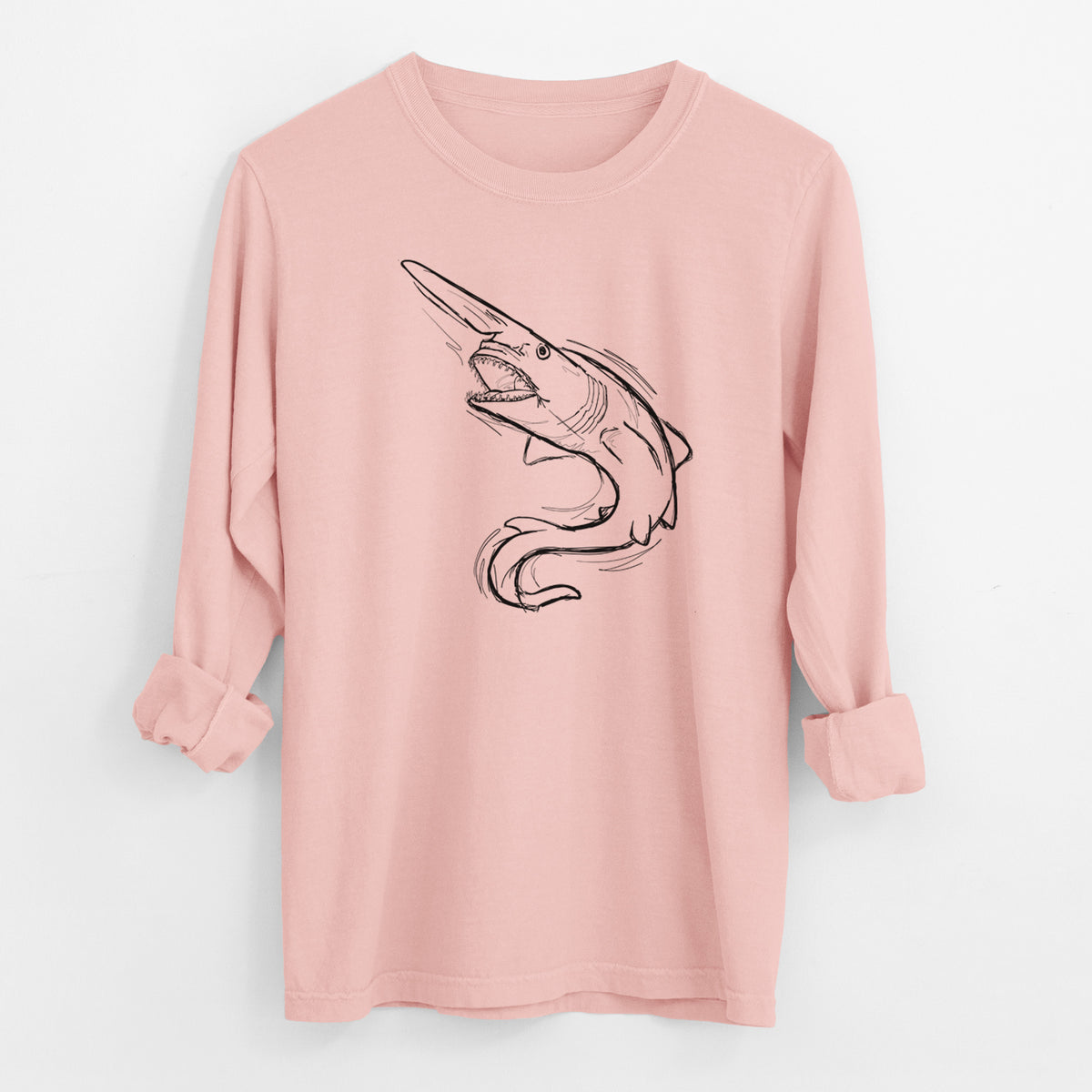 Peachy Comfort Colors long sleeve shirt laid flat with the cuffs rolled, printed with a black ink illustration of a goblin shark with its long snout, swimming in a curve.