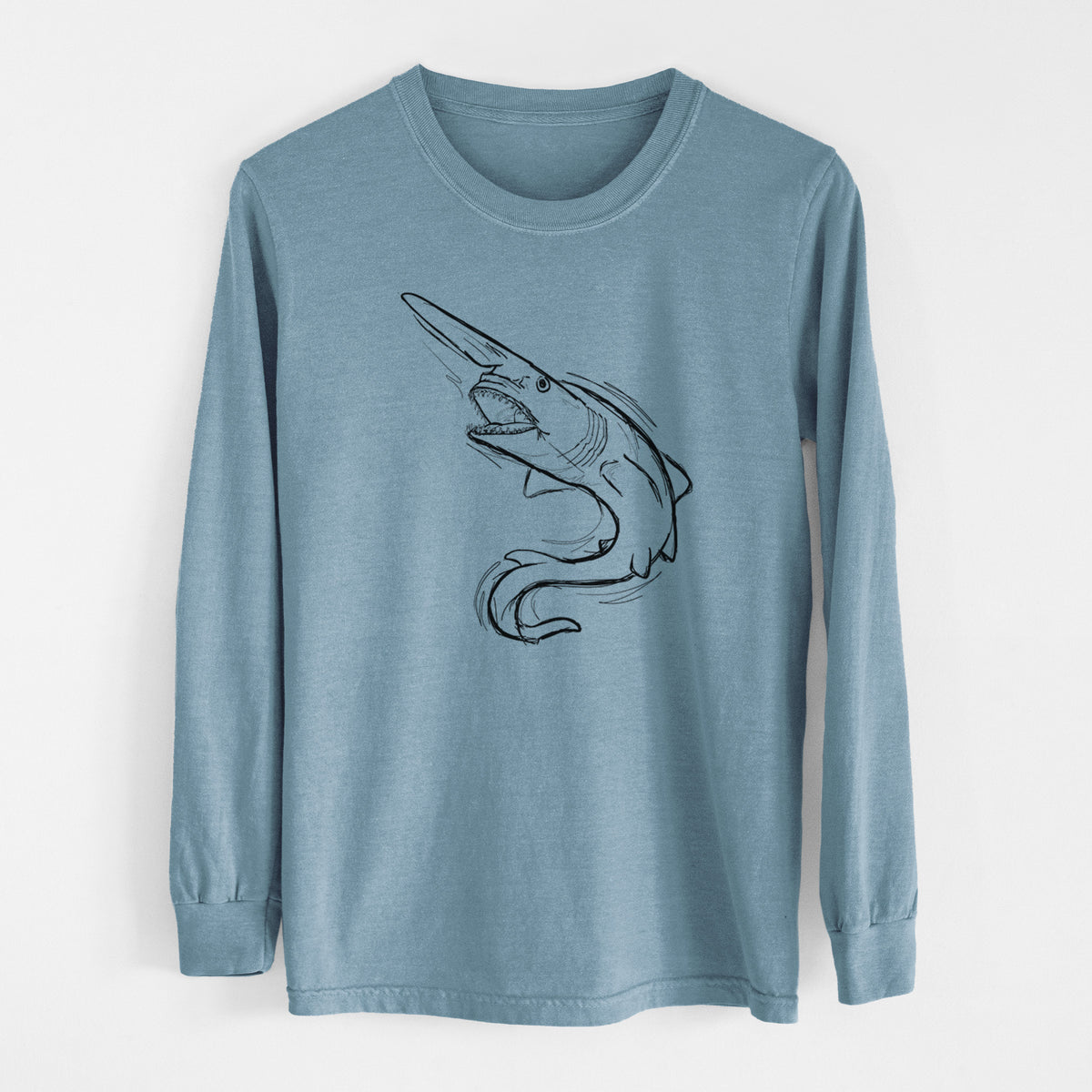 Steel blue Comfort Colors long sleeve shirt laid flat, printed with a black ink illustration of a goblin shark with its long snout, swimming in a curve.