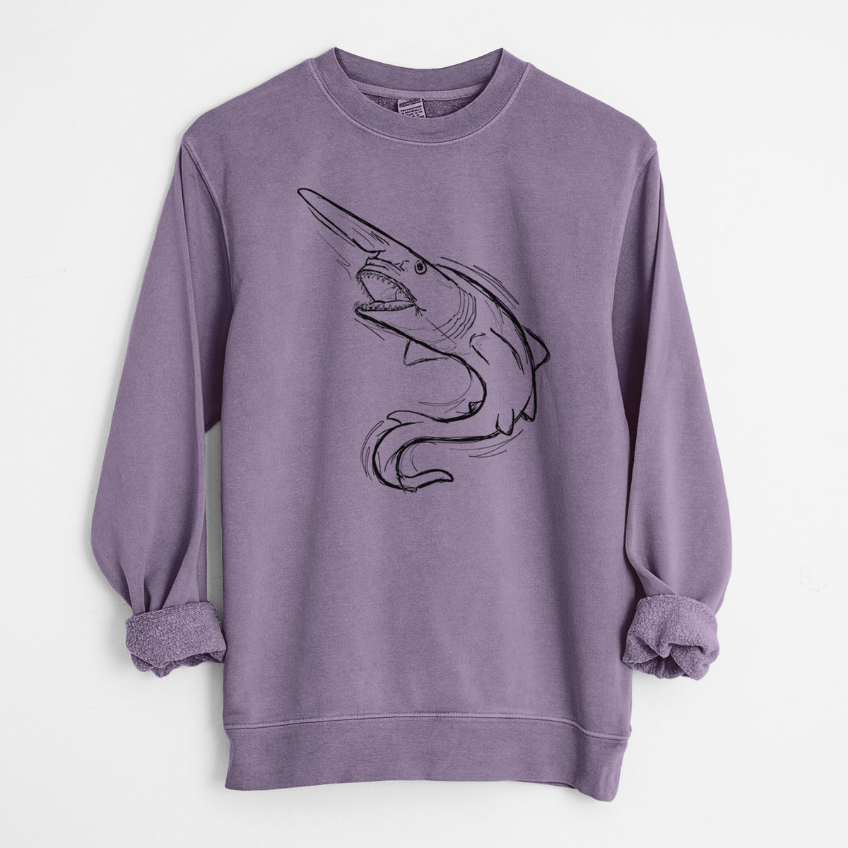 Plum purple pigment dyed crewneck sweatshirt laid flat with the sleeves rolled, printed with a black ink illustration of a goblin shark with its long snout, swimming in a curve.