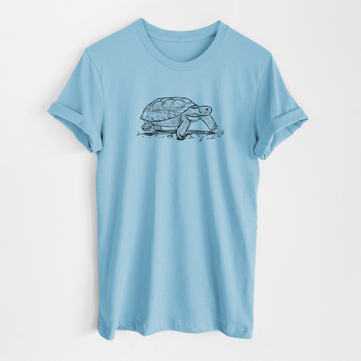 Ocean blue lightweight cotton t-shirt laid flat, printed with a detailed black ink illustration of a gopher tortoise walking.