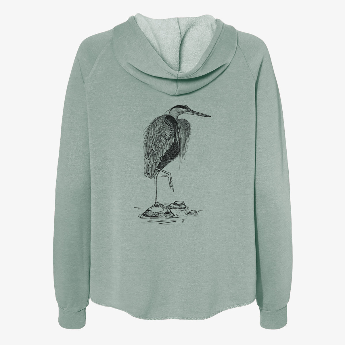 Sage green women's Cali Wave zip-up sweatshirt laid flat, printed with a detailed black ink illustration of a great blue heron standing on rocks.