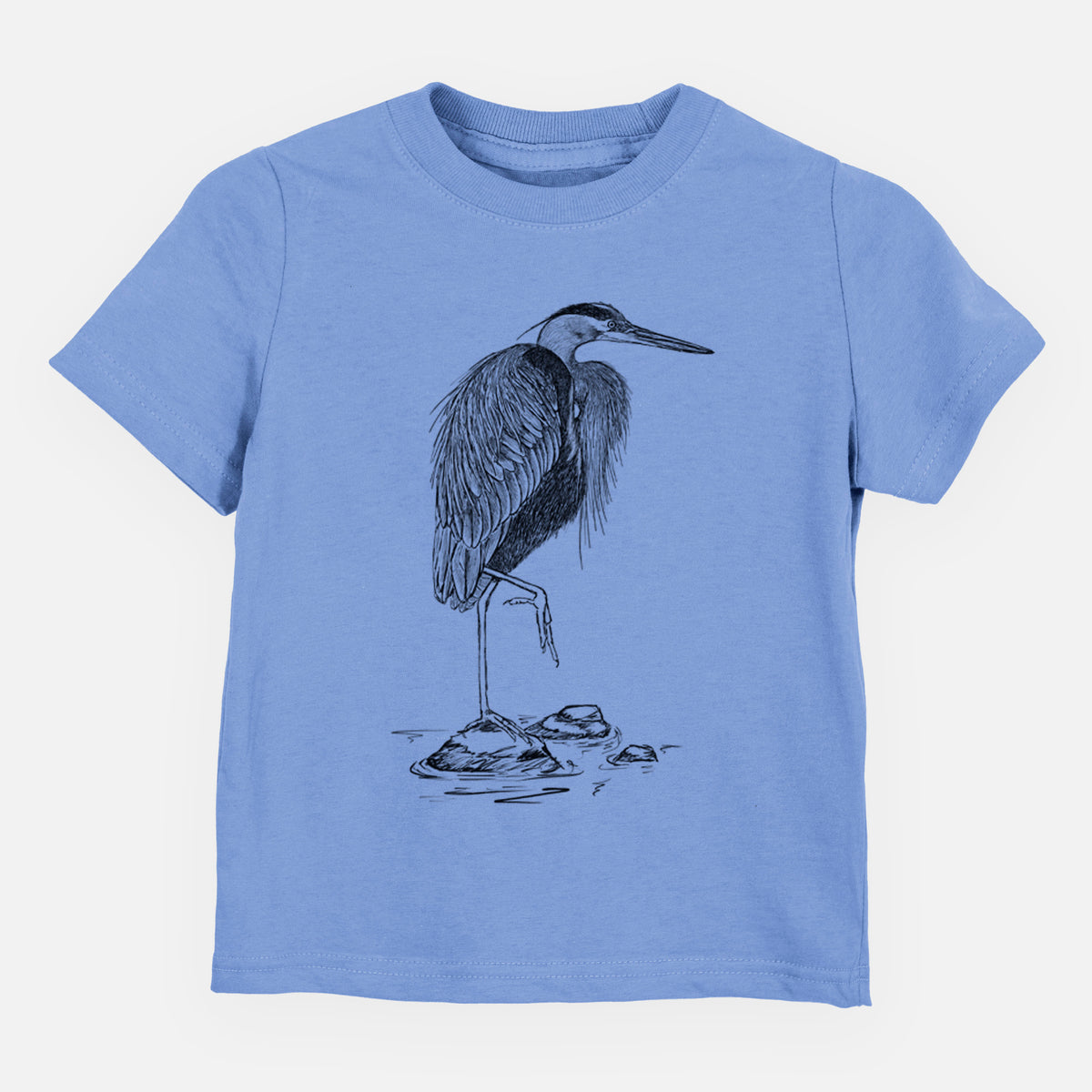 Carolina blue toddler t-shirt laid flat, printed with a detailed black ink illustration of a great blue heron standing on rocks.