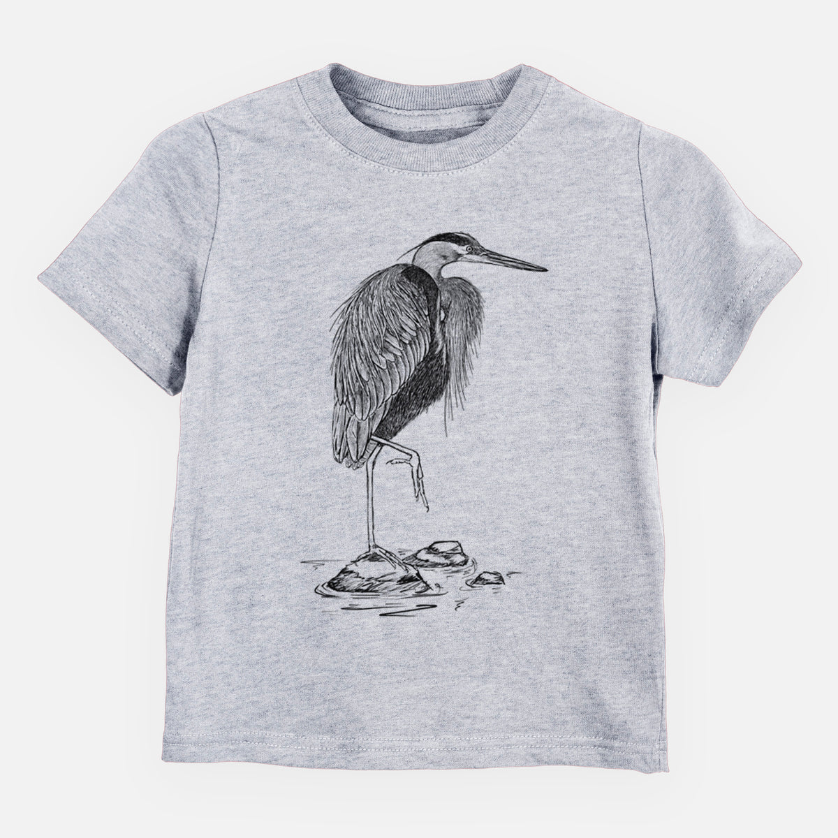 Heather grey toddler t-shirt laid flat, printed with a detailed black ink illustration of a great blue heron standing on rocks.