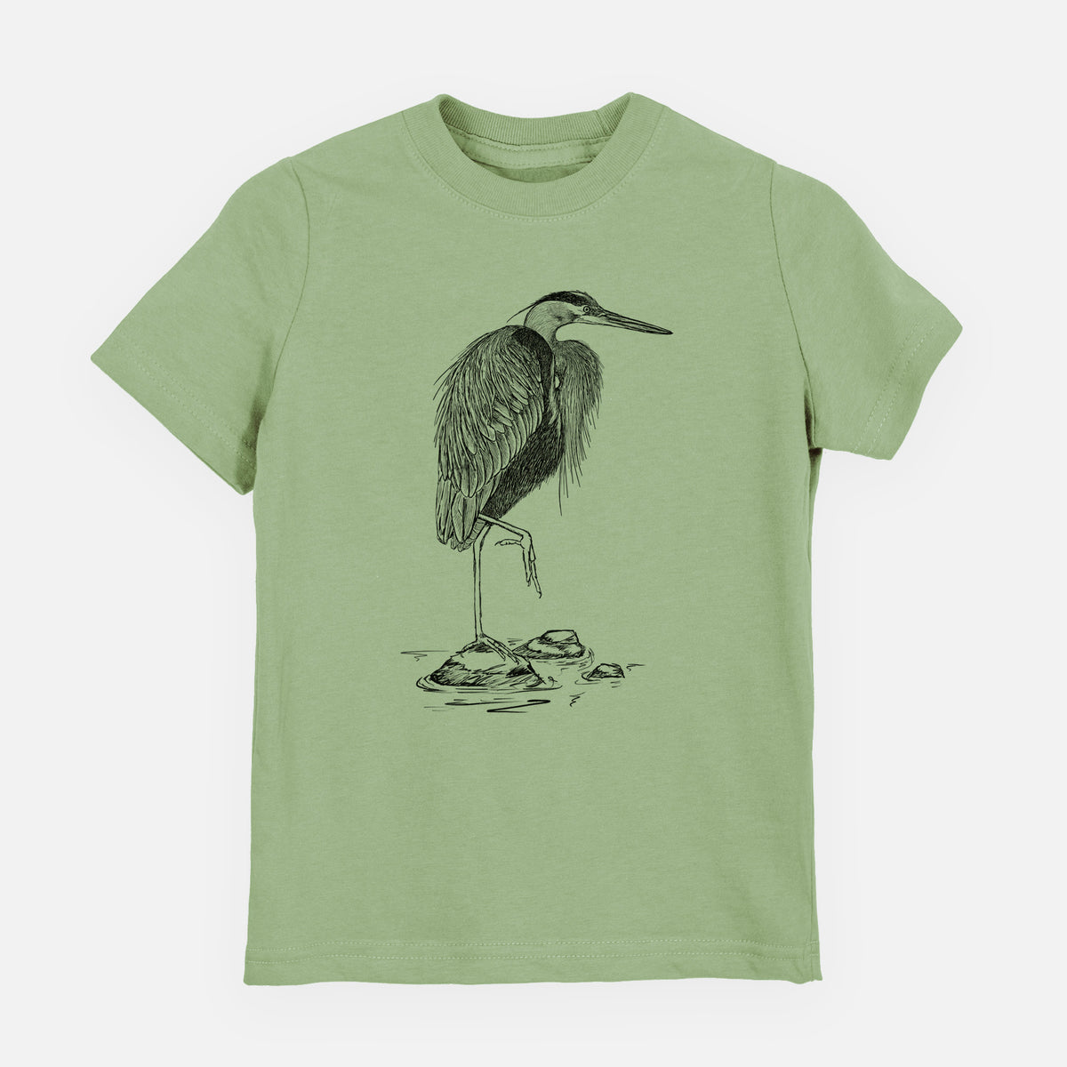 Sage green youth t-shirt laid flat, printed with a detailed black ink illustration of a great blue heron standing on rocks.