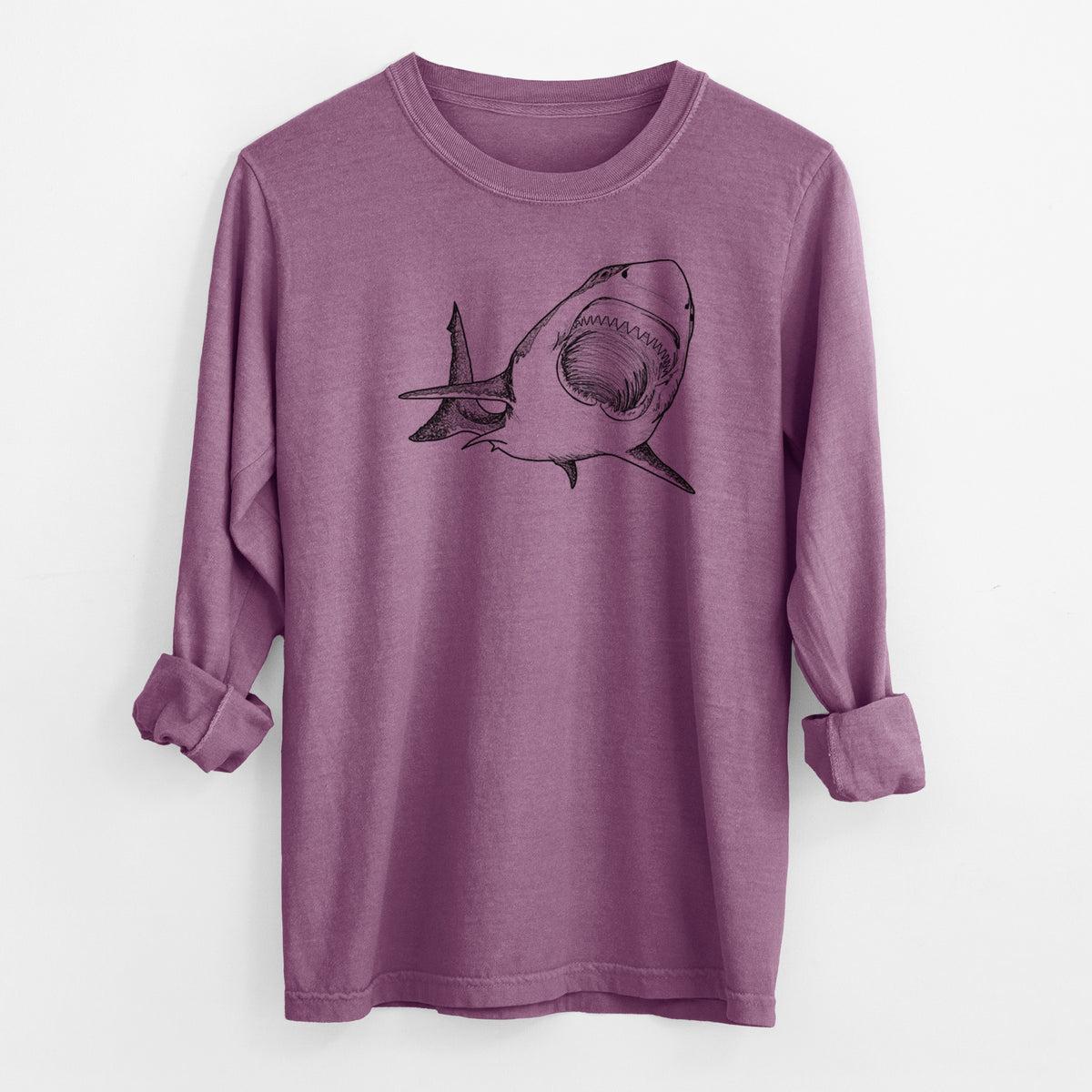 Berry pink Comfort Colors long sleeve shirt laid flat with the cuffs rolled, printed with a black ink illustration of a great white shark swimming toward the viewer with its mouth open.