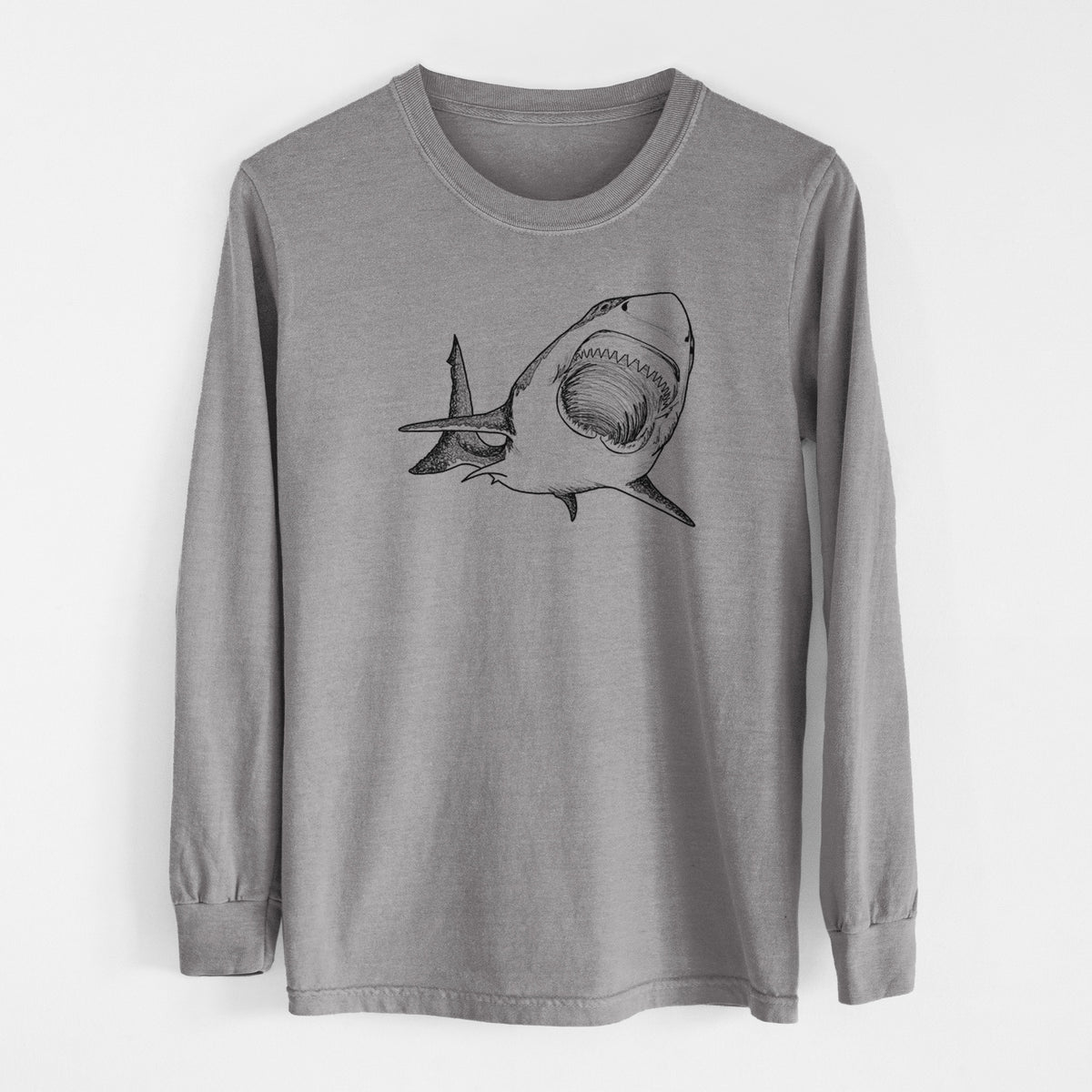 Grey Comfort Colors long sleeve shirt laid flat, printed with a black ink illustration of a great white shark swimming toward the viewer with its mouth open.