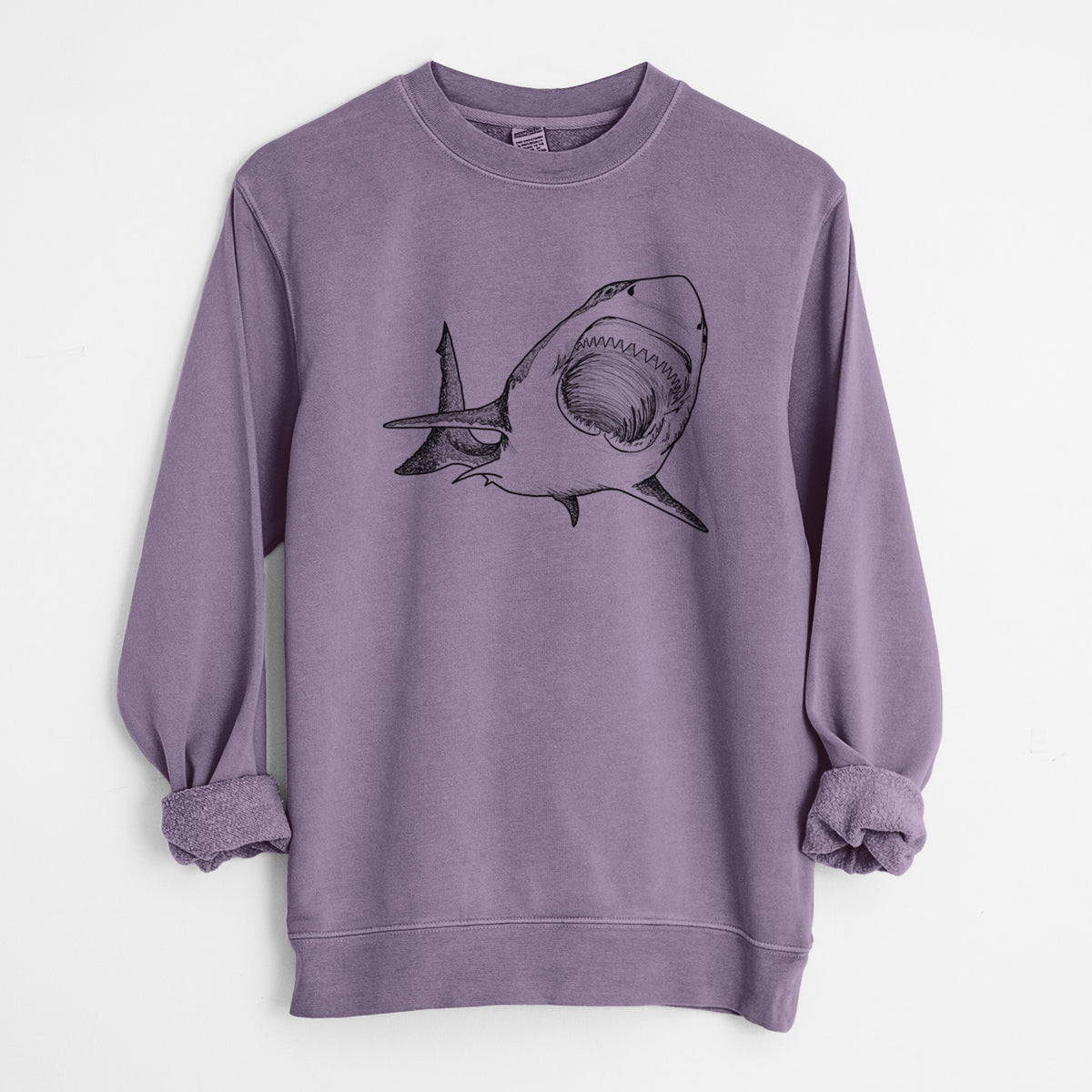 Plum purple pigment dyed crewneck sweatshirt laid flat with the sleeves rolled, printed with a black ink illustration of a great white shark swimming toward the viewer with its mouth open.