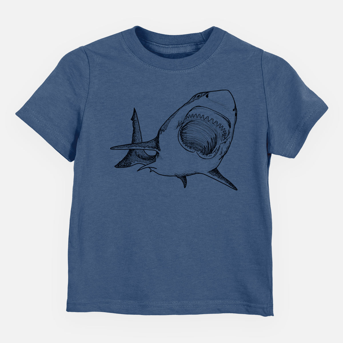 Indigo blue toddler t-shirt laid flat, printed with a black ink illustration of a great white shark swimming toward the viewer with its mouth open.