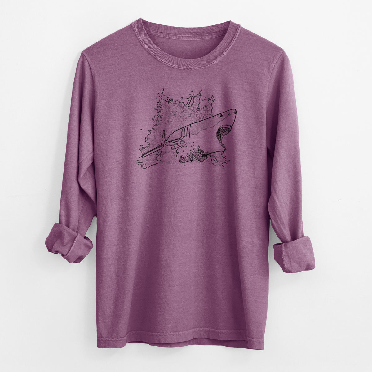 Berry pink Comfort Colors long sleeve shirt laid flat with the cuffs rolled, printed with a black ink illustration of a great white shark breaking through a splash of water.