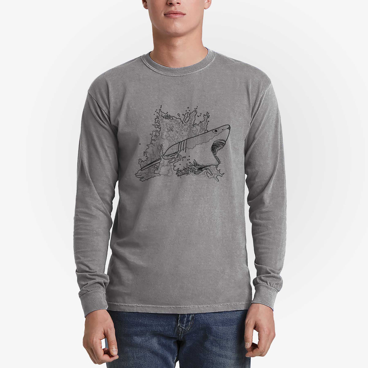 Man wearing a grey Comfort Colors long sleeve shirt printed with a black ink illustration of a great white shark breaking through a splash of water.