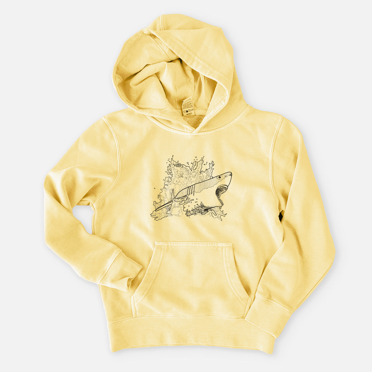 Pigment yellow youth pigment dyed hoodie laid flat, printed with a black ink illustration of a great white shark breaking through a splash of water.
