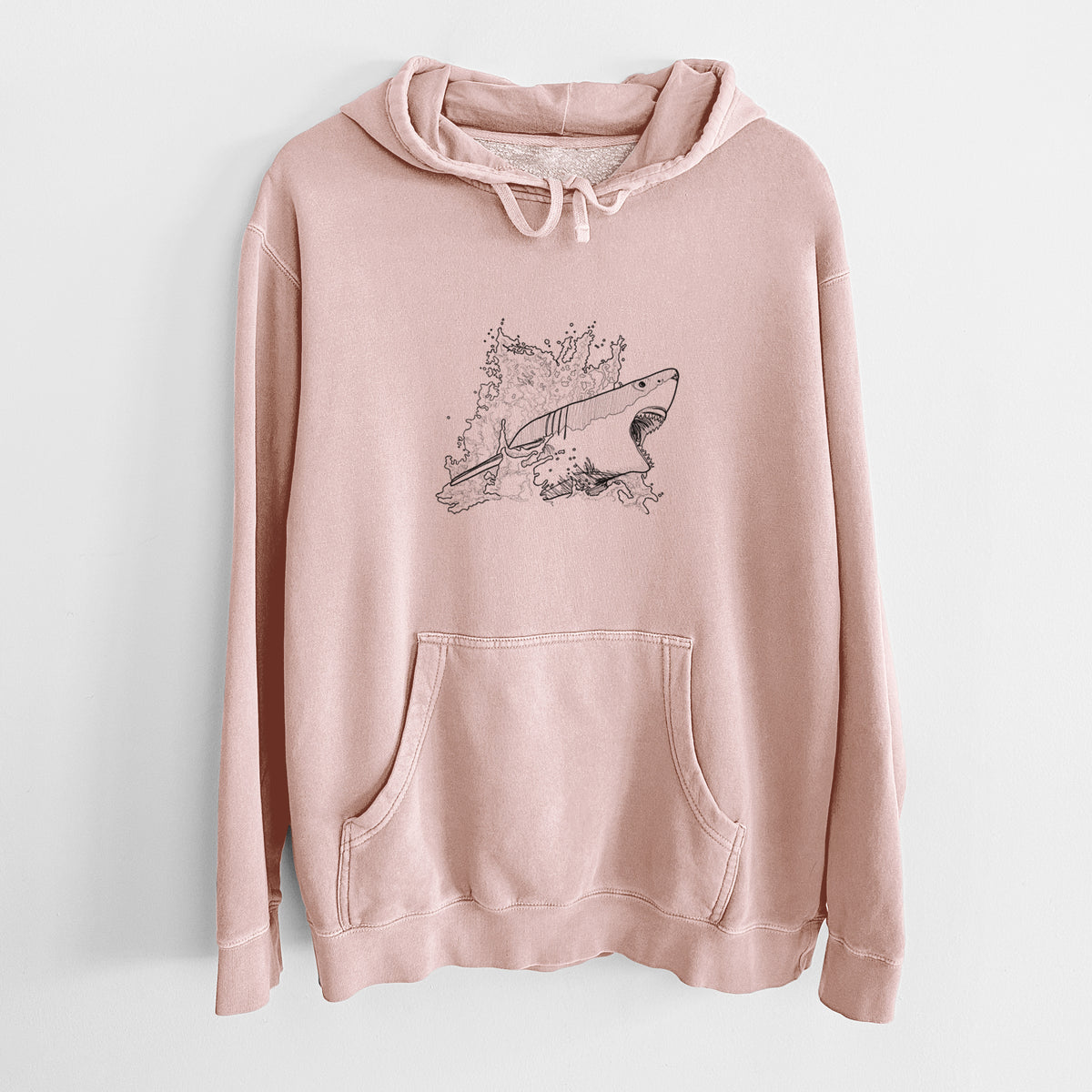 Dusty pink pigment dyed hoodie laid flat, printed with a black ink illustration of a great white shark breaking through a splash of water.