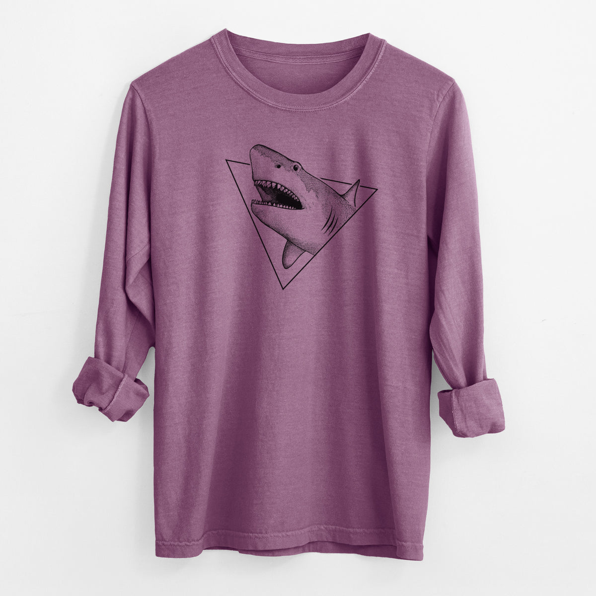 Berry pink Comfort Colors long sleeve shirt laid flat with the cuffs rolled, printed with a black ink great white shark bursting out of a triangle outline with its mouth open.
