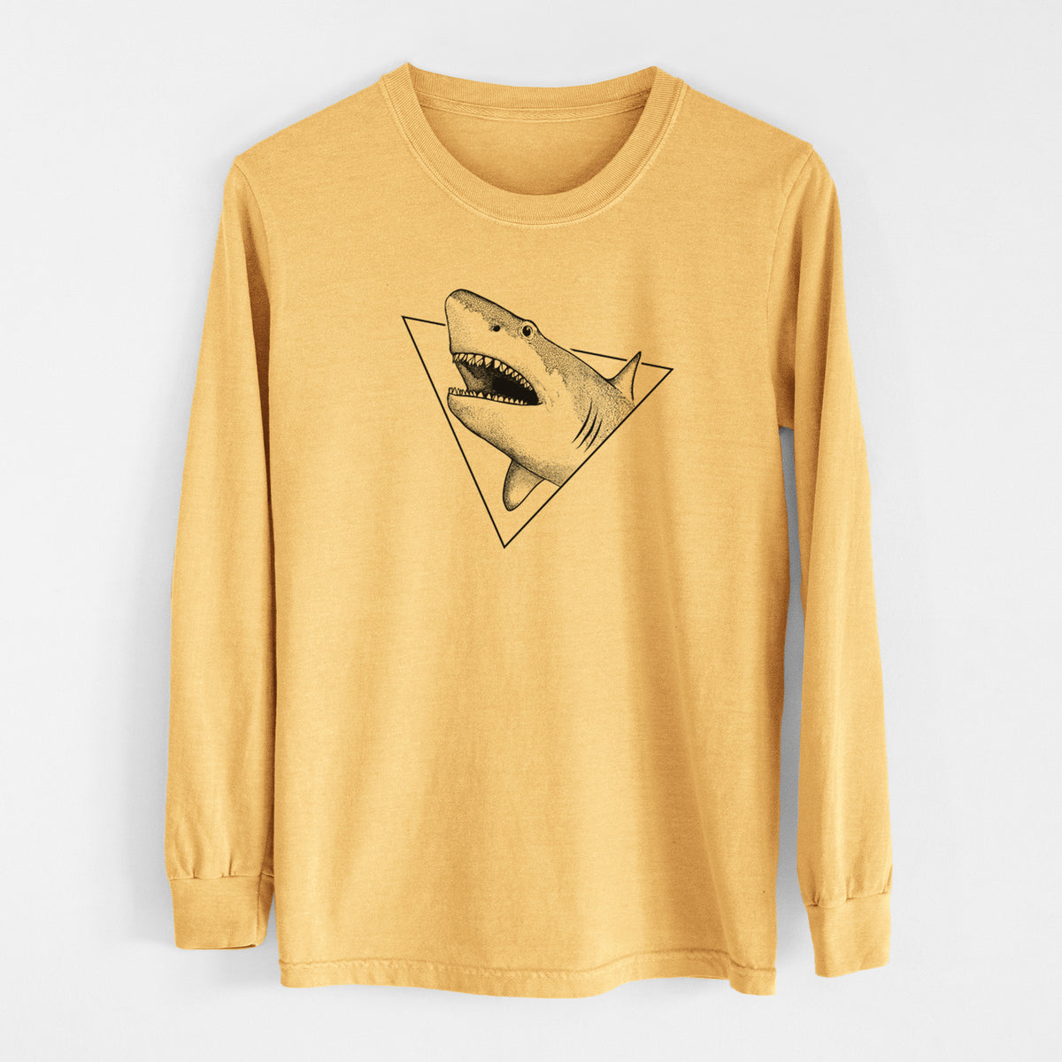 Golden wheat yellow Comfort Colors long sleeve shirt laid flat, printed with a black ink great white shark bursting out of a triangle outline with its mouth open.