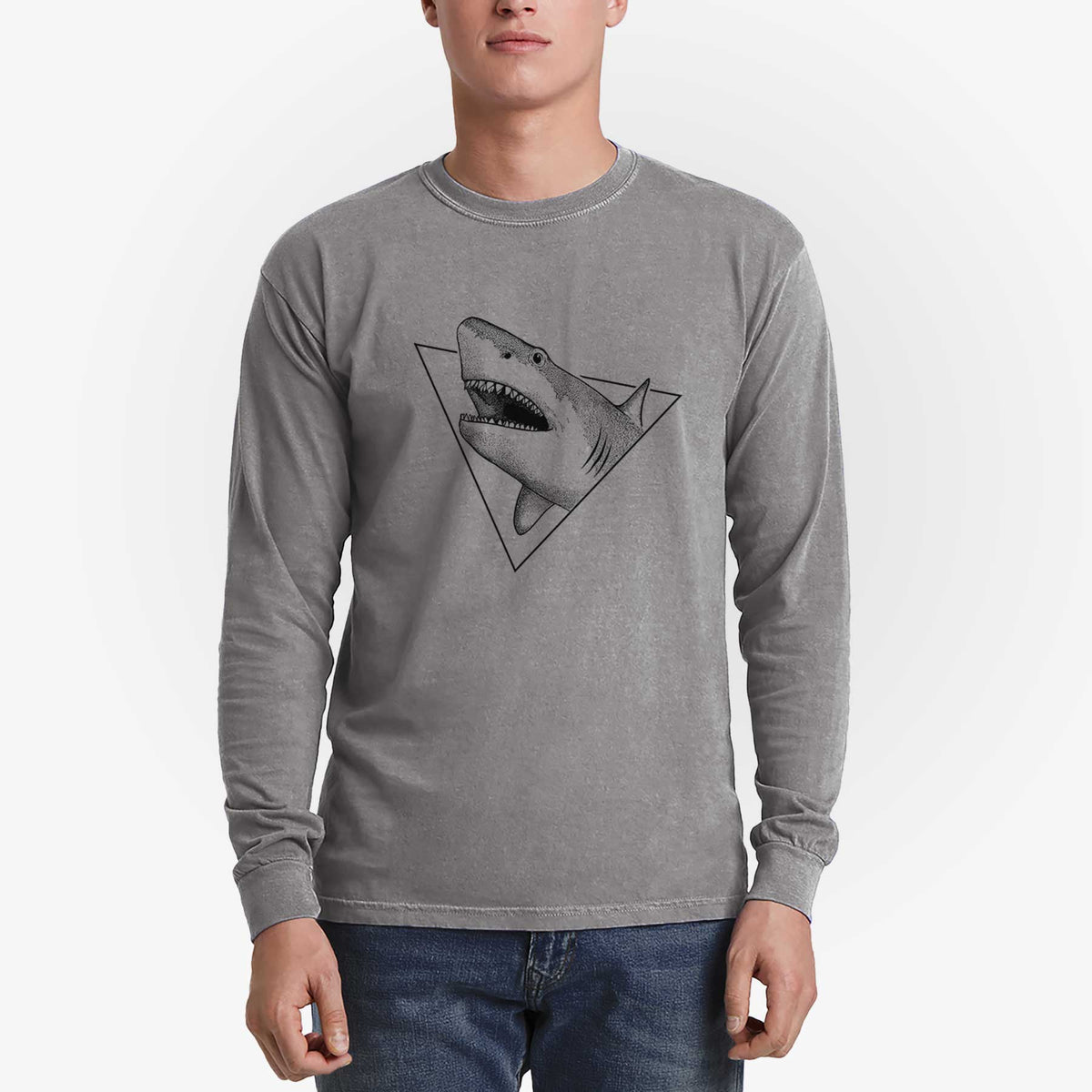 Man wearing a grey Comfort Colors long sleeve shirt printed with a black ink great white shark bursting out of a triangle outline with its mouth open.