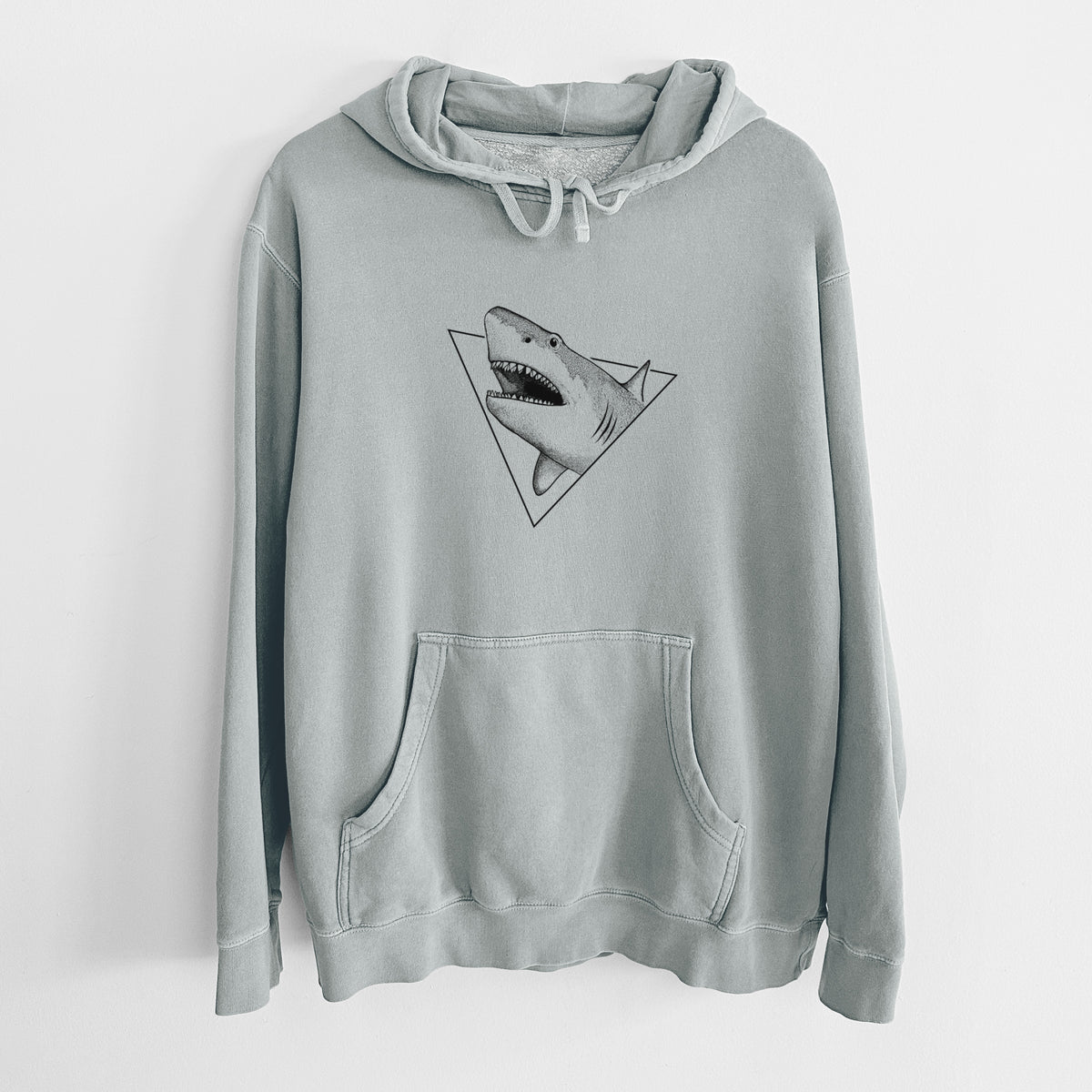 Sage green pigment dyed hoodie laid flat, printed with a black ink great white shark bursting out of a triangle outline with its mouth open.