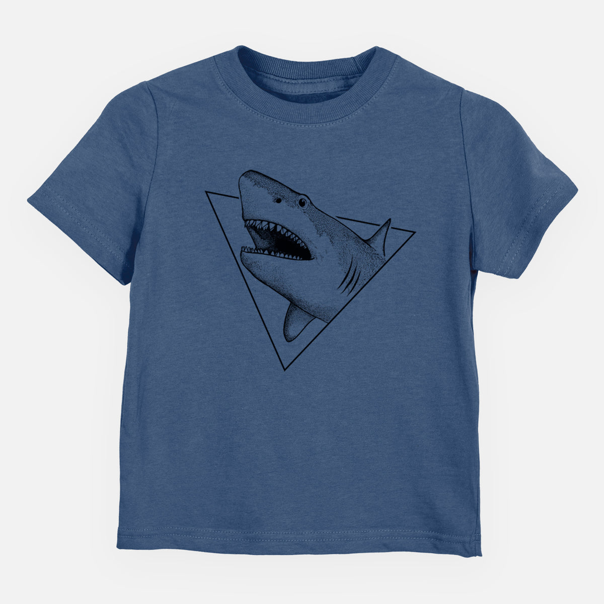 Indigo blue toddler t-shirt laid flat, printed with a black ink great white shark bursting out of a triangle outline with its mouth open.