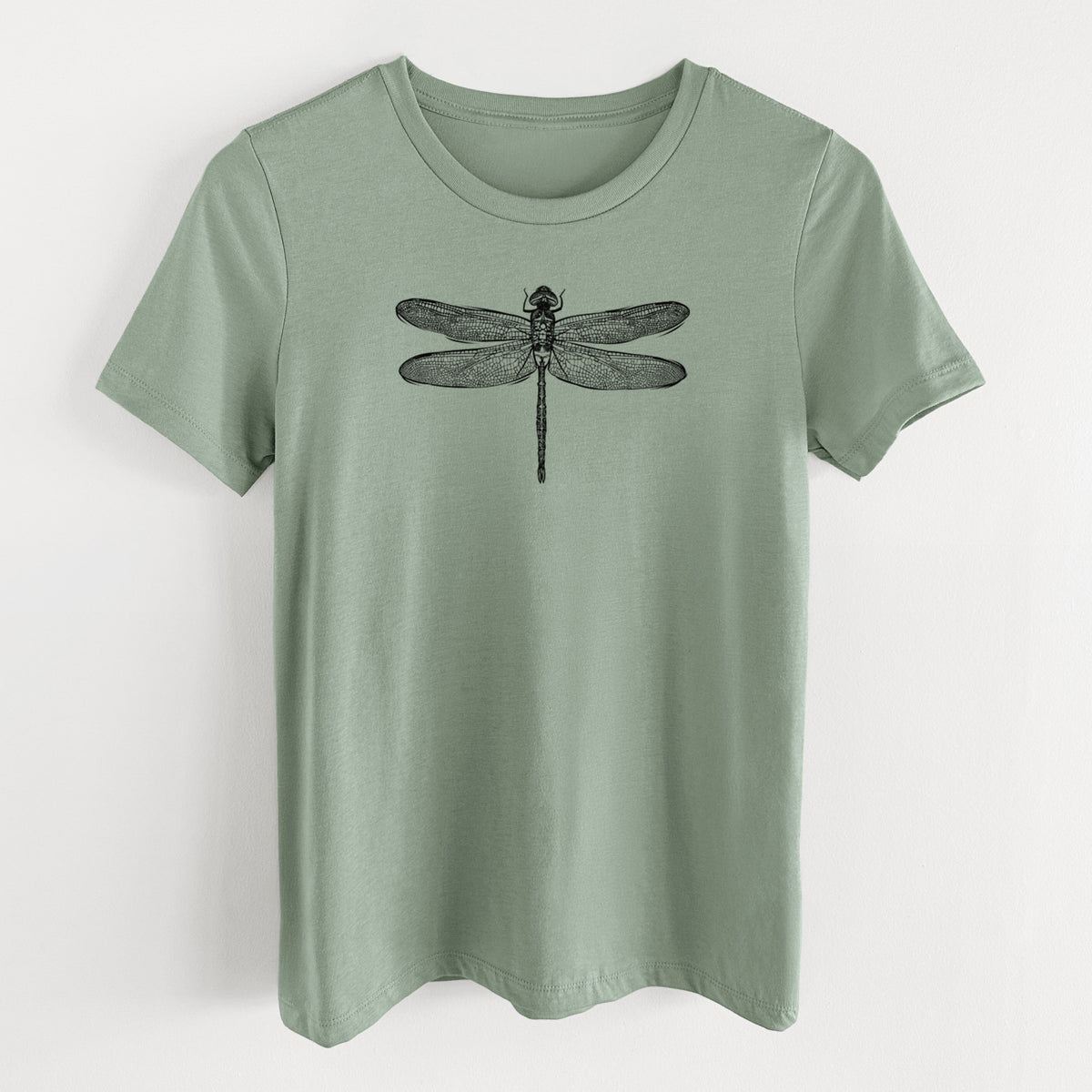 Sage green women's relaxed fit cotton t-shirt laid flat, printed with a detailed black ink illustration of a green darner dragonfly with its wings spread, seen from above.