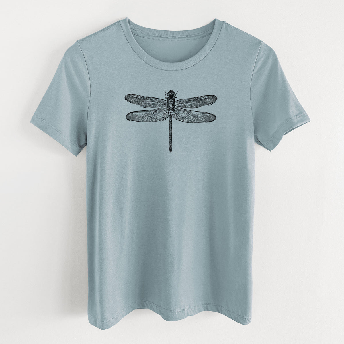 Vintage denim women's relaxed fit cotton t-shirt laid flat, printed with a detailed black ink illustration of a green darner dragonfly with its wings spread, seen from above.