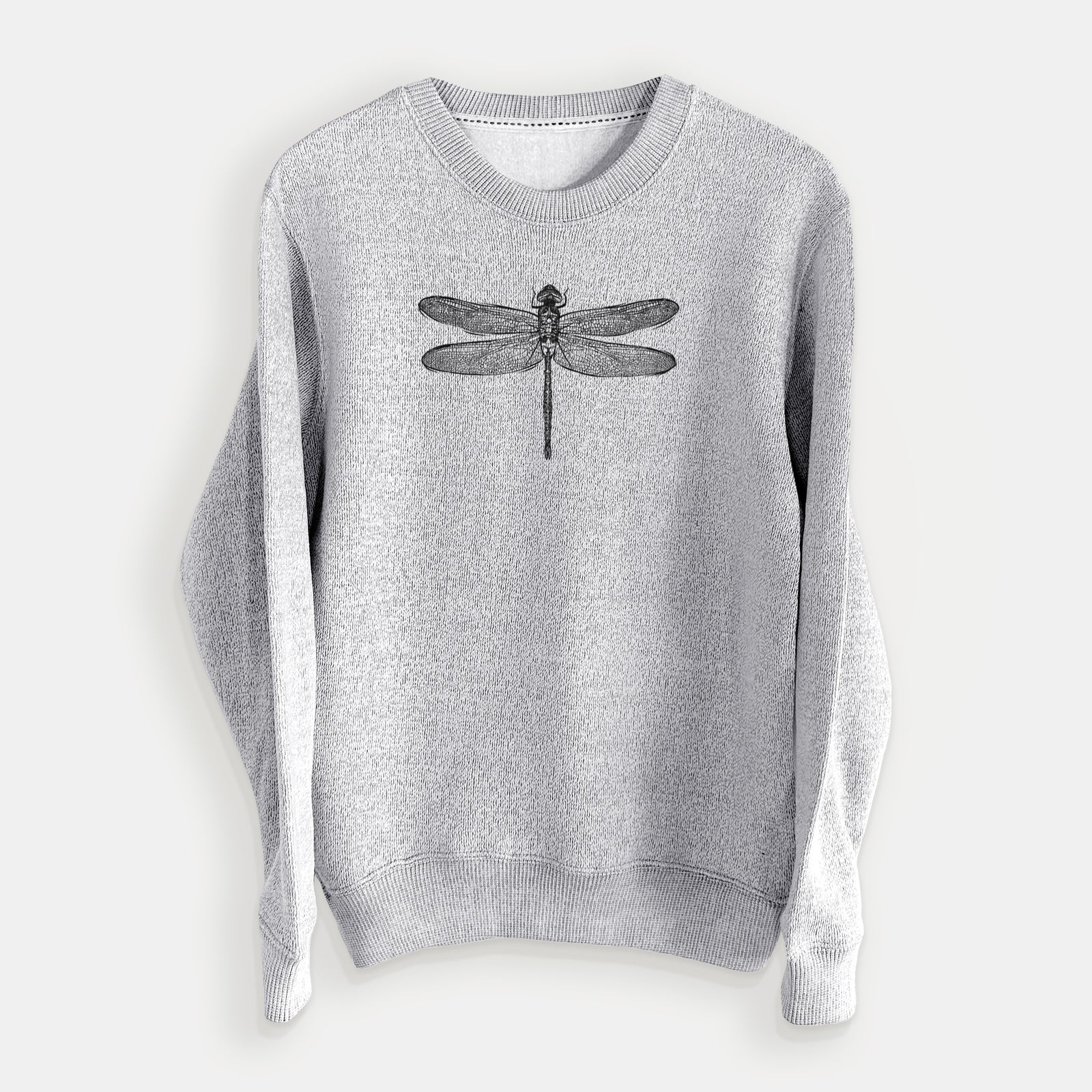 Salt and pepper knit sweatshirt laid flat, printed with a detailed black ink illustration of a green darner dragonfly with its wings spread, seen from above.