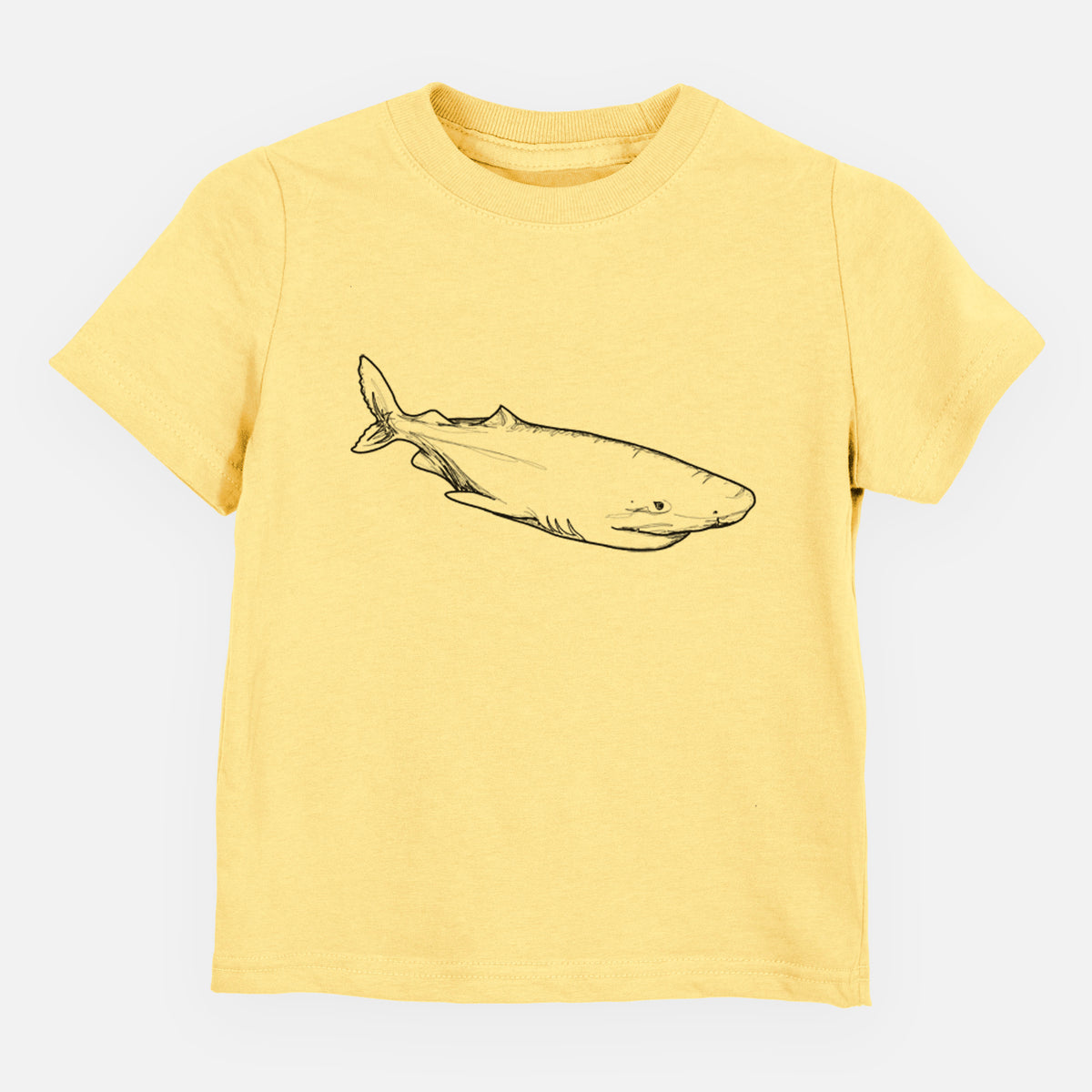 Butter yellow toddler t-shirt laid flat, printed with a black ink illustration of a Greenland shark swimming.