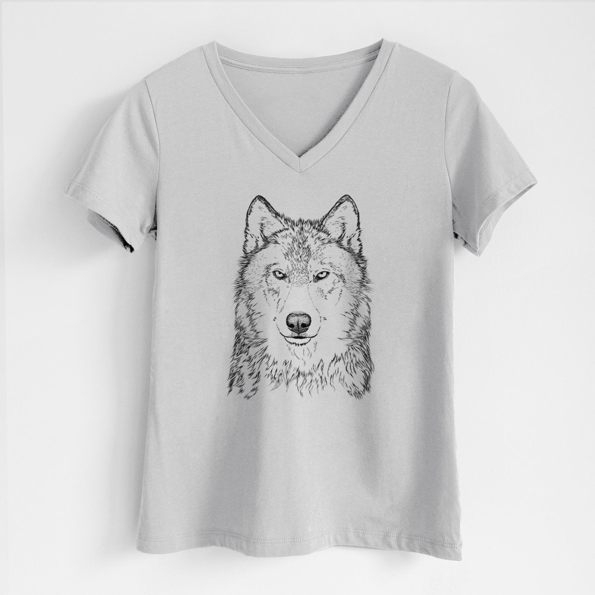 Lunar grey women's relaxed fit cotton V-neck t-shirt laid flat, printed with a detailed black ink portrait of a grey wolf facing forward.